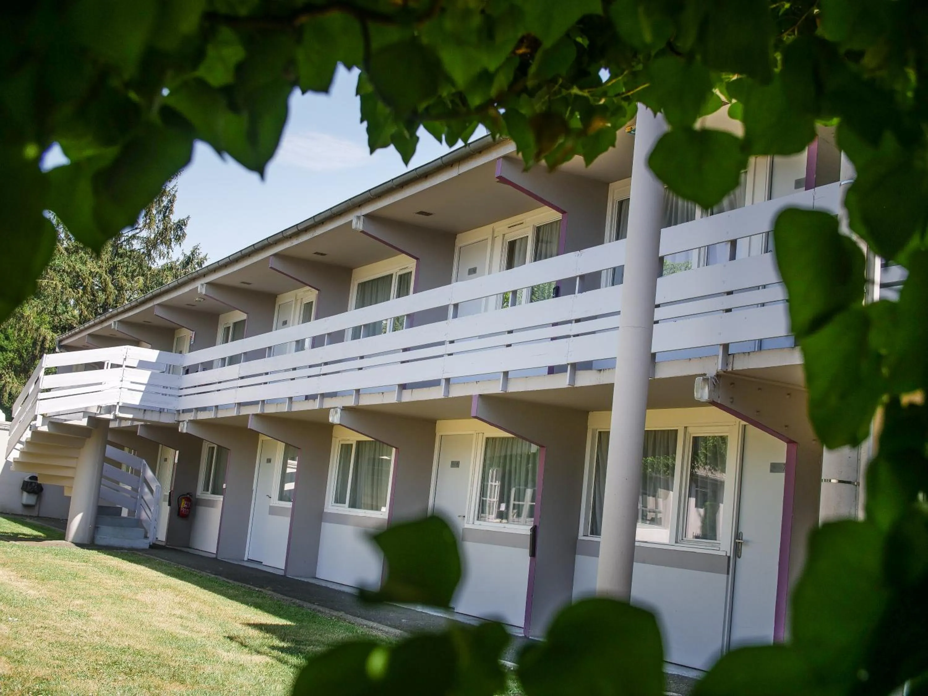 Property building in Hôtel Inn Design Resto Novo Sablé