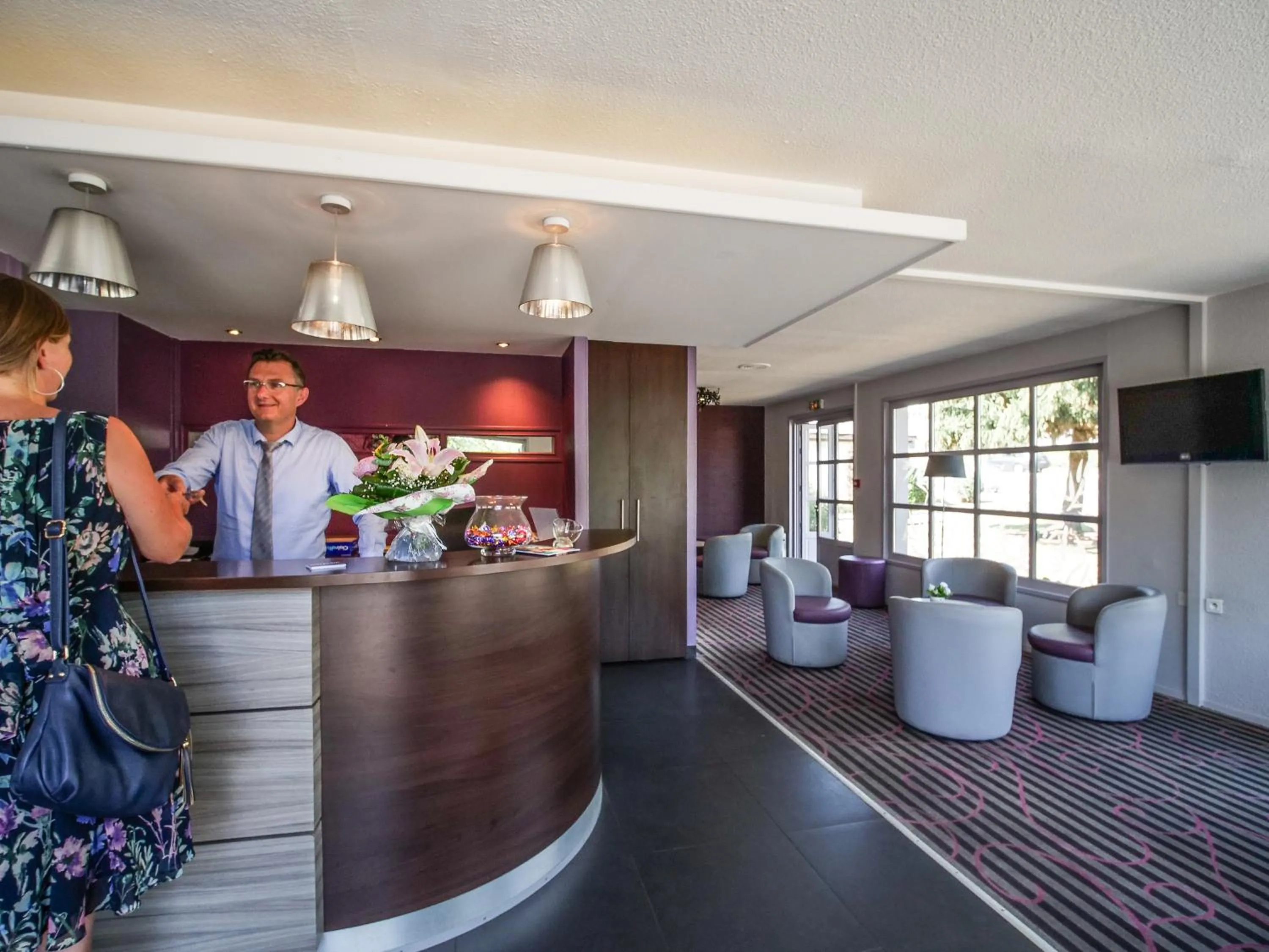 Staff in Hôtel Inn Design Resto Novo Sablé