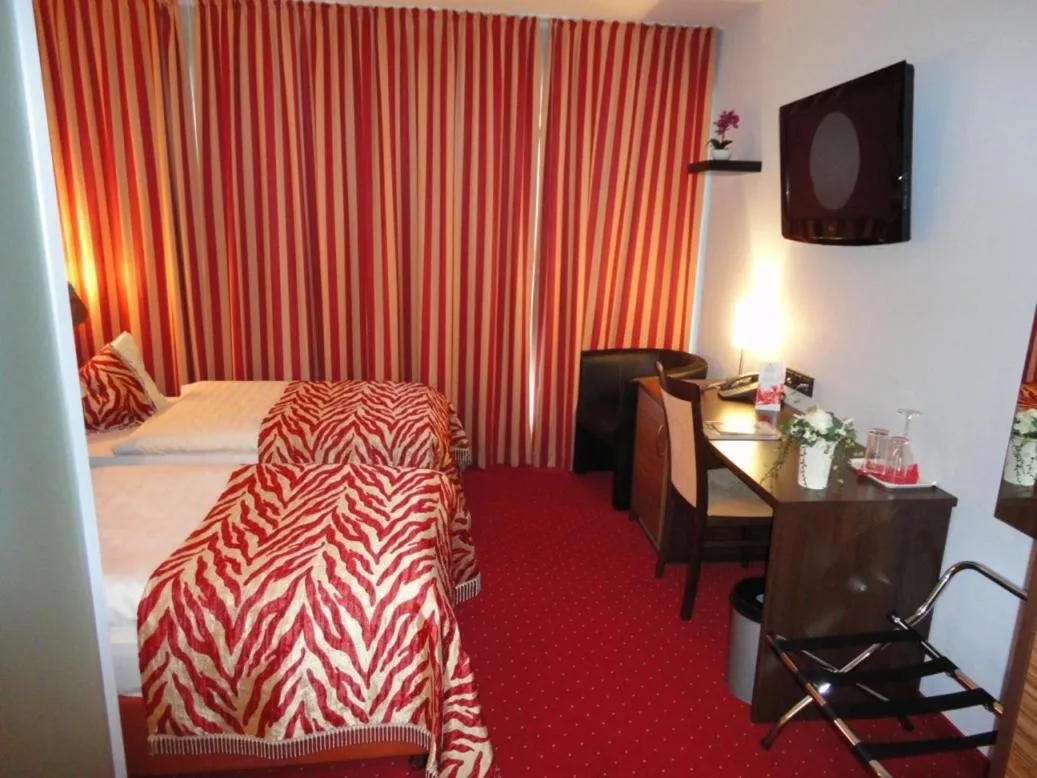 Bed in Grand Hotel Dream Main City Center