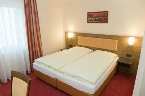 Bed in Grand Hotel Dream Main City Center