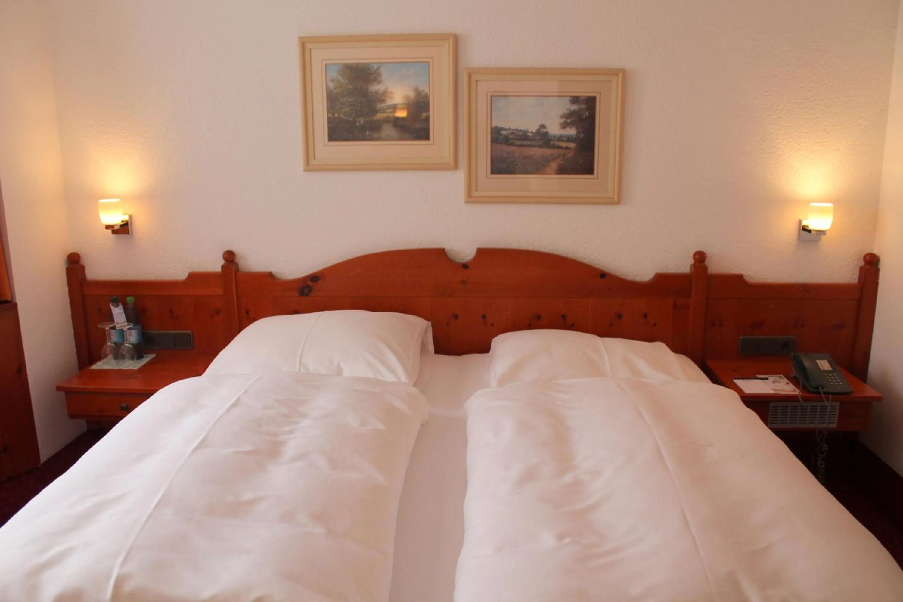 Bedroom, Bed in Steichele Hotel & Weinrestaurant