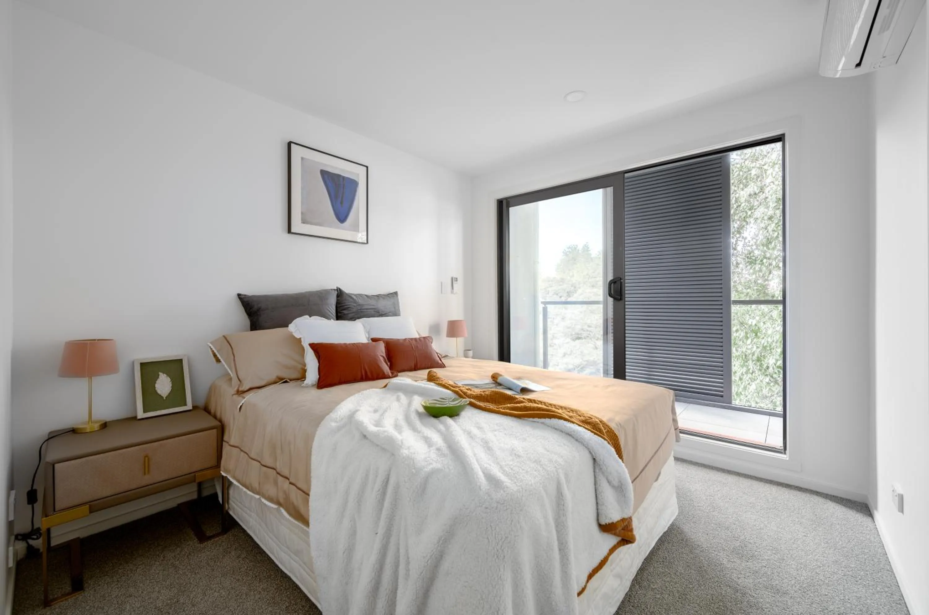 Bed in Sunrise Garden Suites