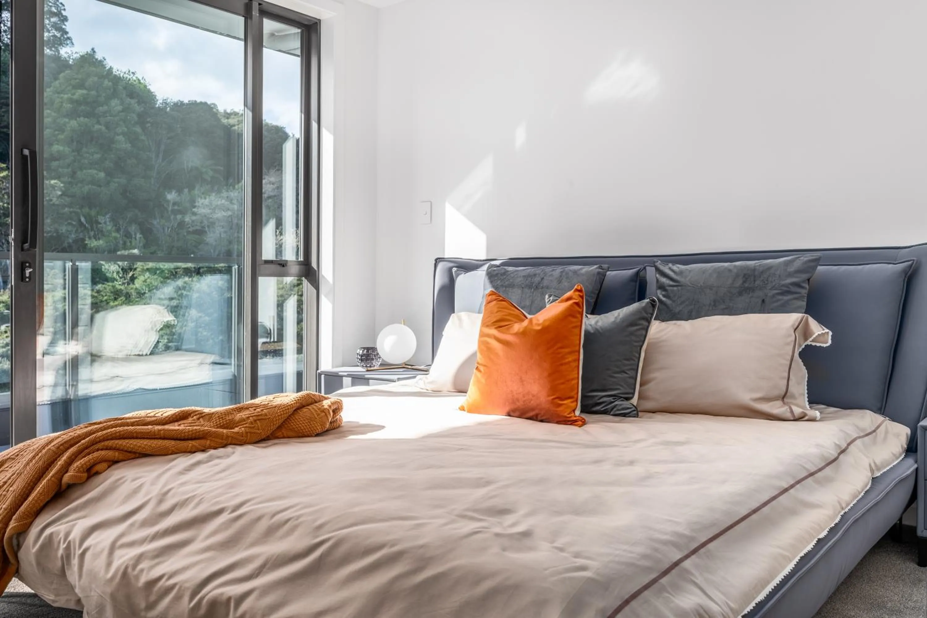 Bed in Sunrise Garden Suites