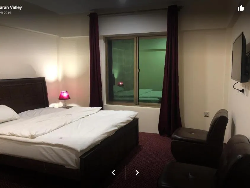 Bed in Arcadian Inn Hotel