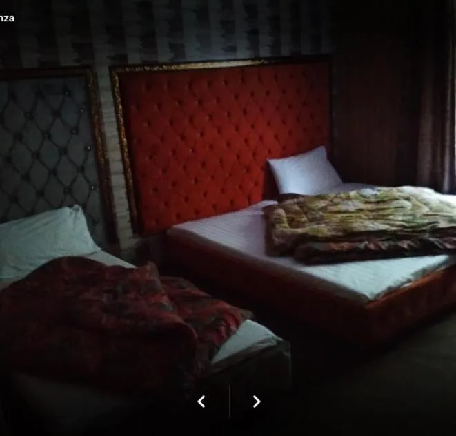 Bed in Arcadian Inn Hotel