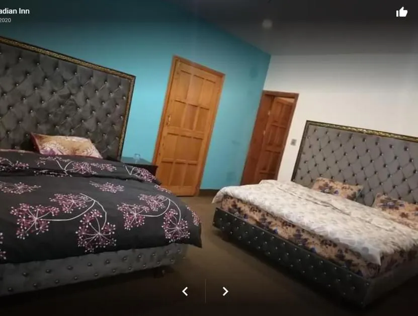 Bed in Arcadian Inn Hotel