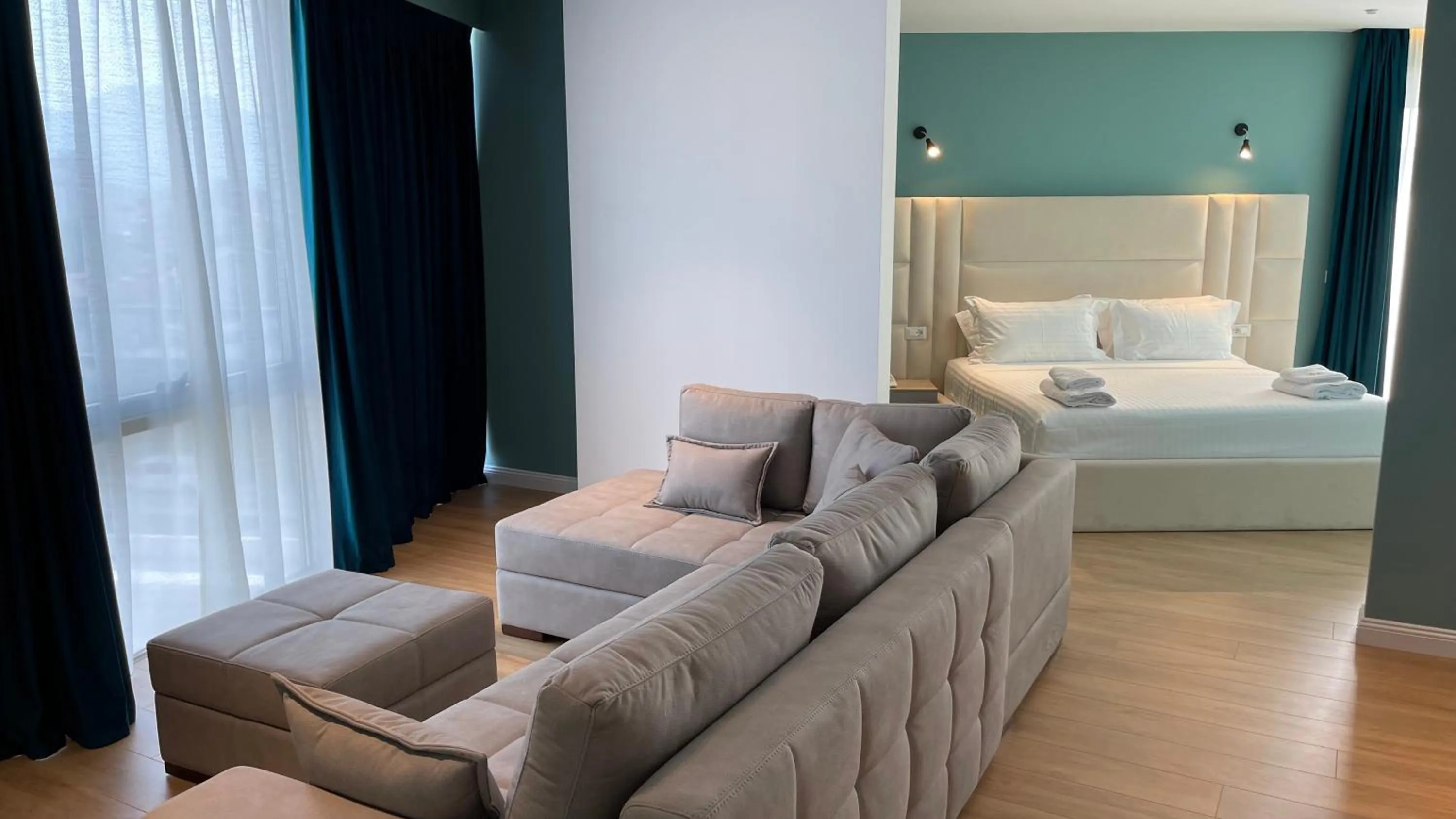 Seating area, Bed in Granda Hotel