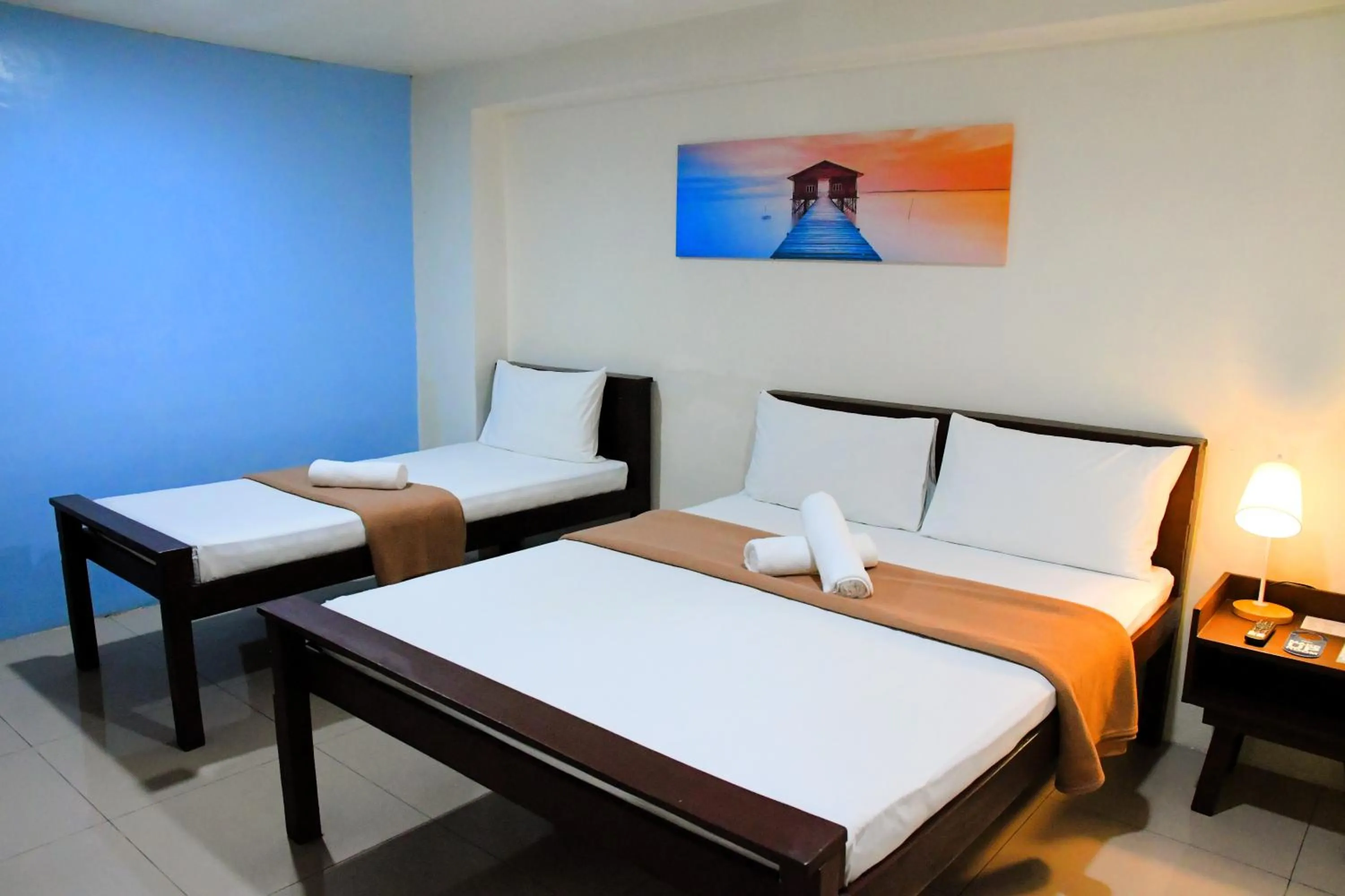 Bed in Arzo Hotel Makati