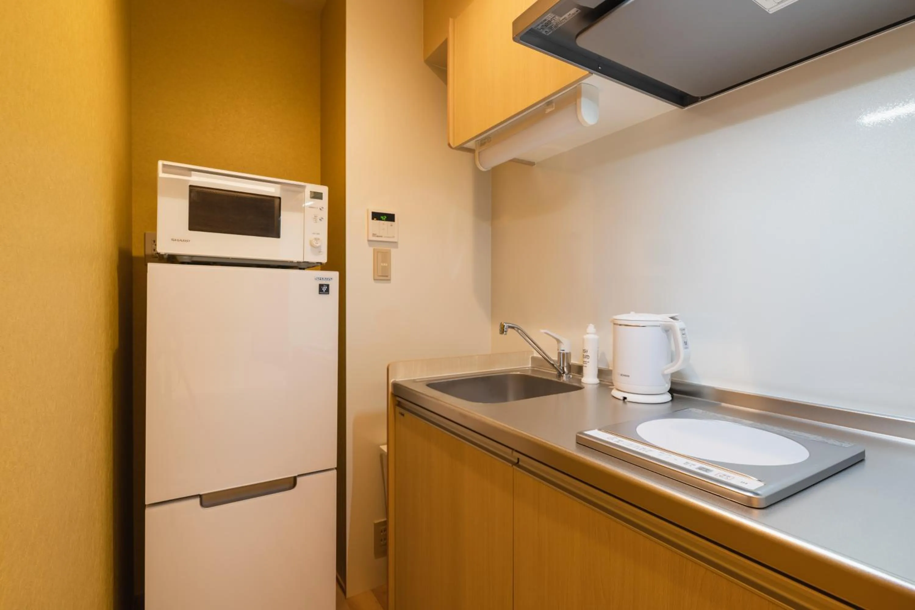 Kitchen or kitchenette in GRAND BASE Nagasaki Nakamachi