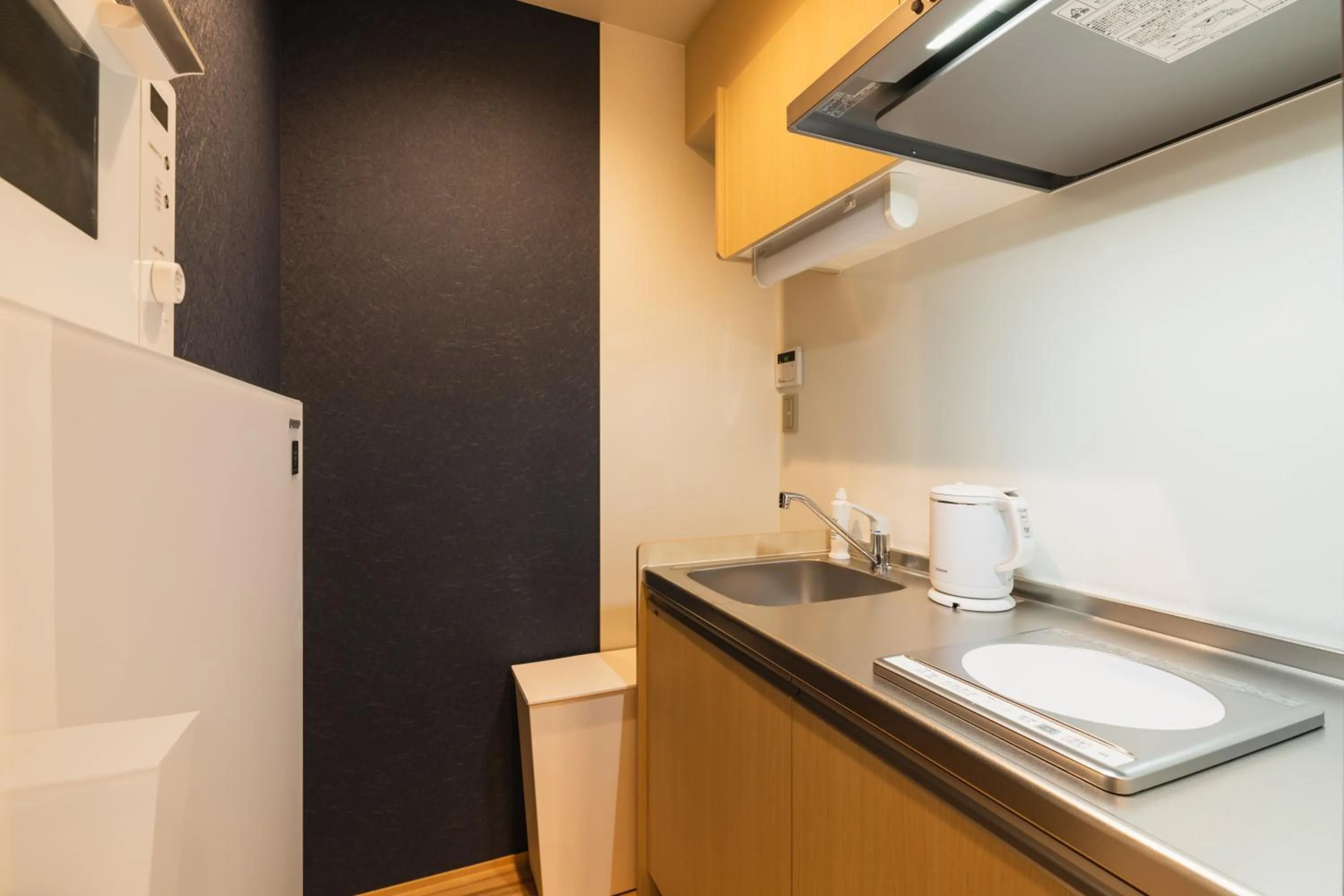 Kitchen or kitchenette in GRAND BASE Nagasaki Nakamachi