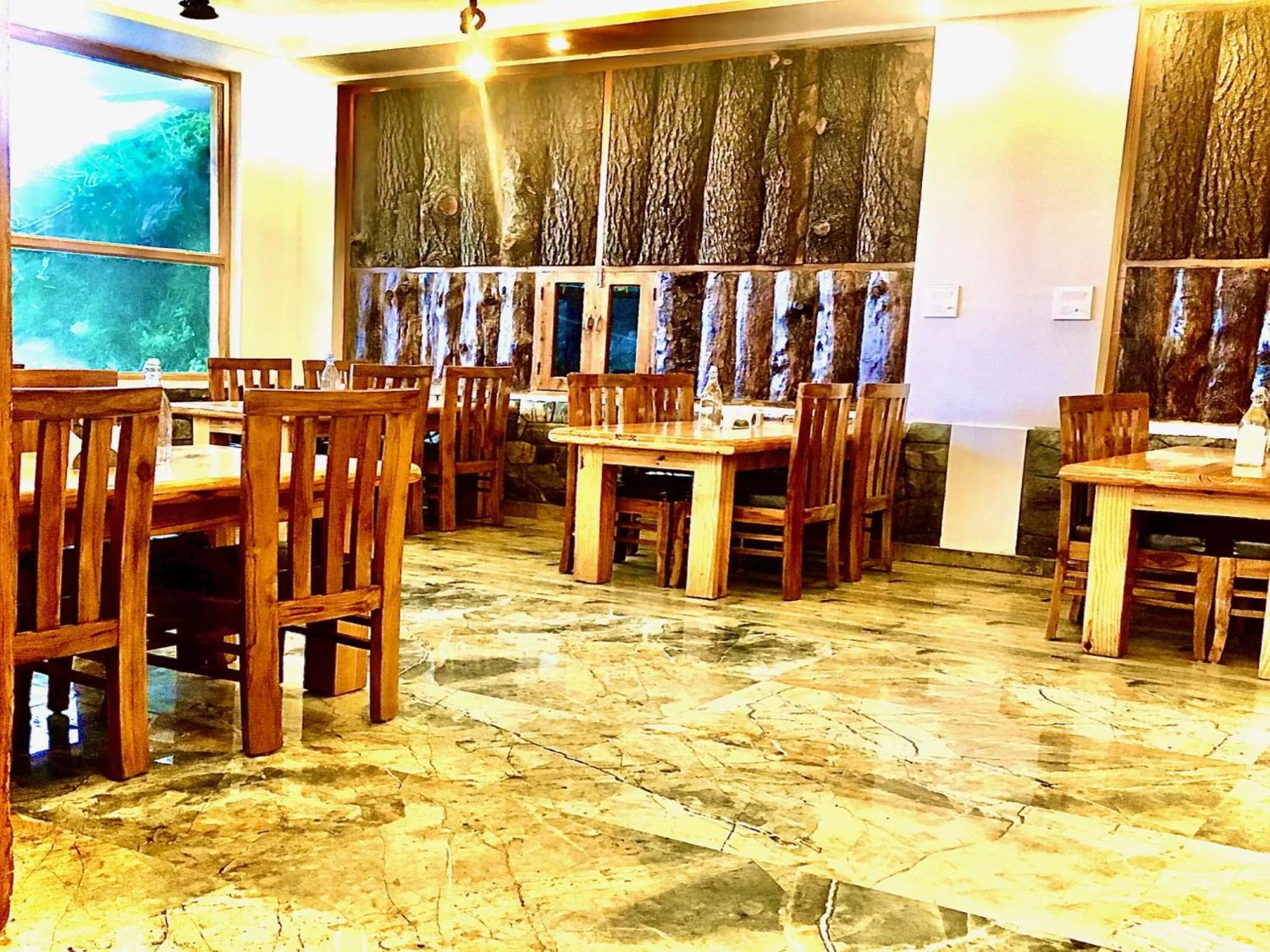 Restaurant/places to eat in LA Riqueza Kanatal - Mountain View Rooms - Best Location - Amazing Food - Close to Jungle Safari & Adventure Activities