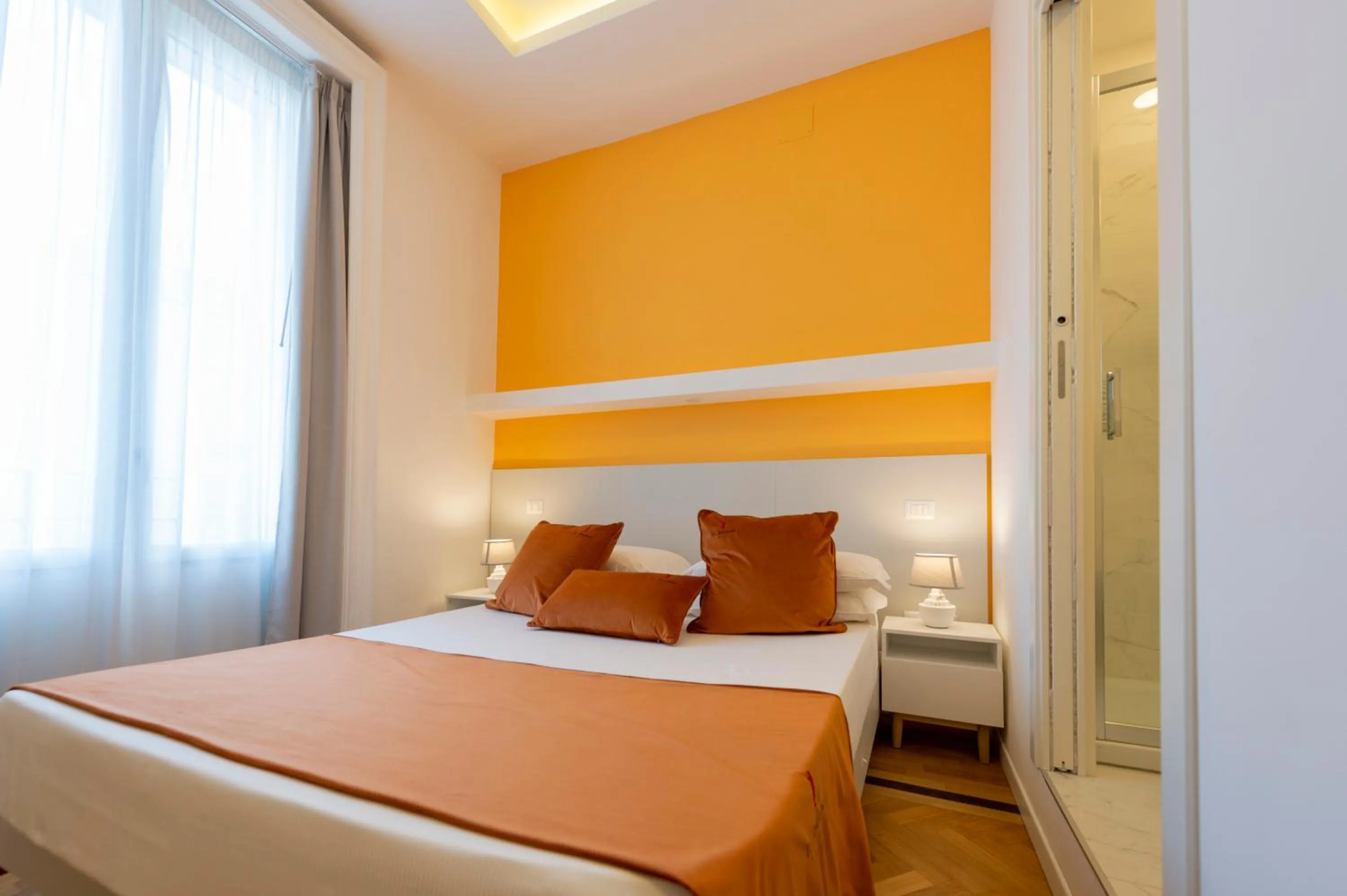 Bed in Le Angioine Rooms