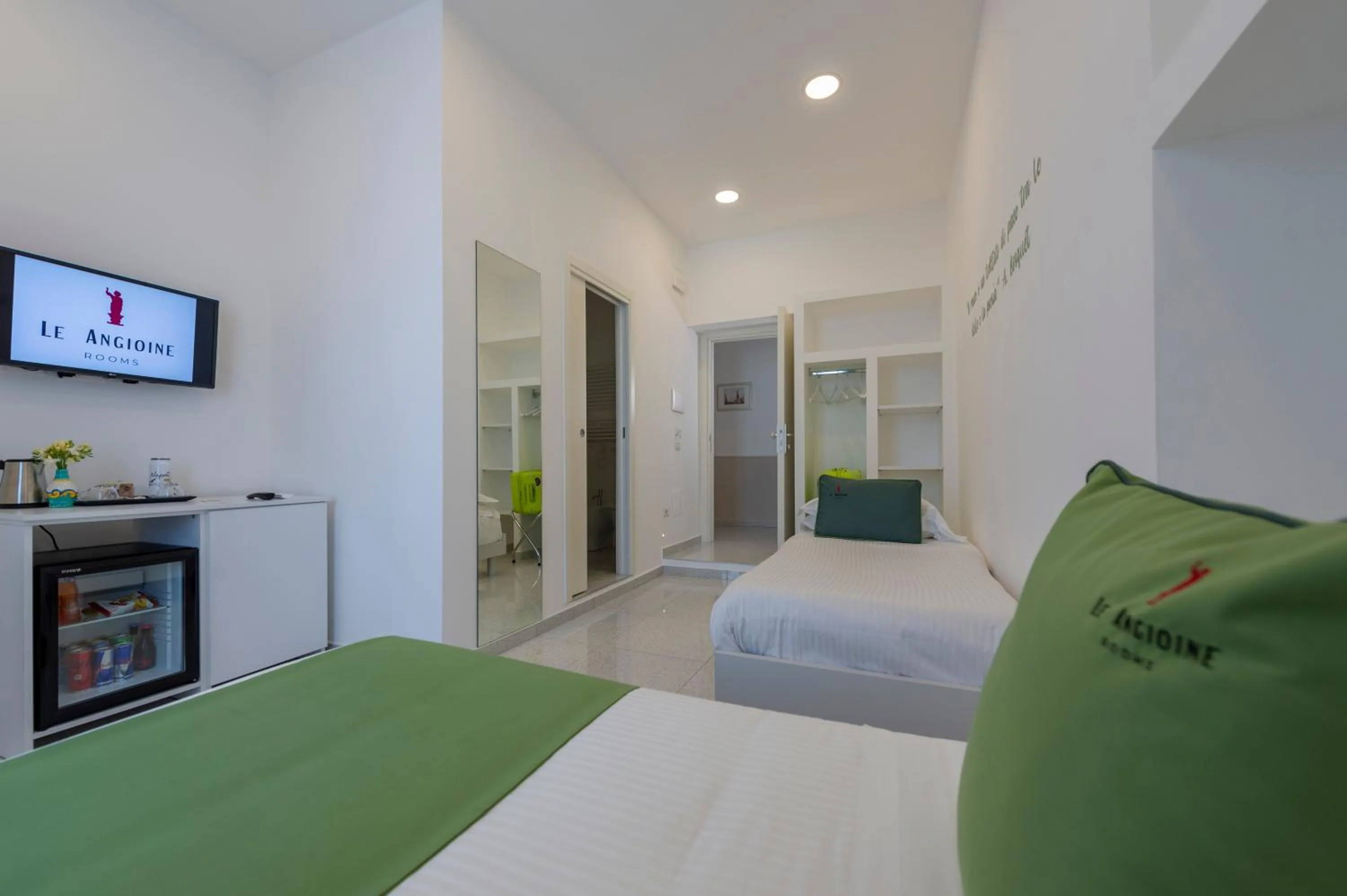 Bed in Le Angioine Rooms