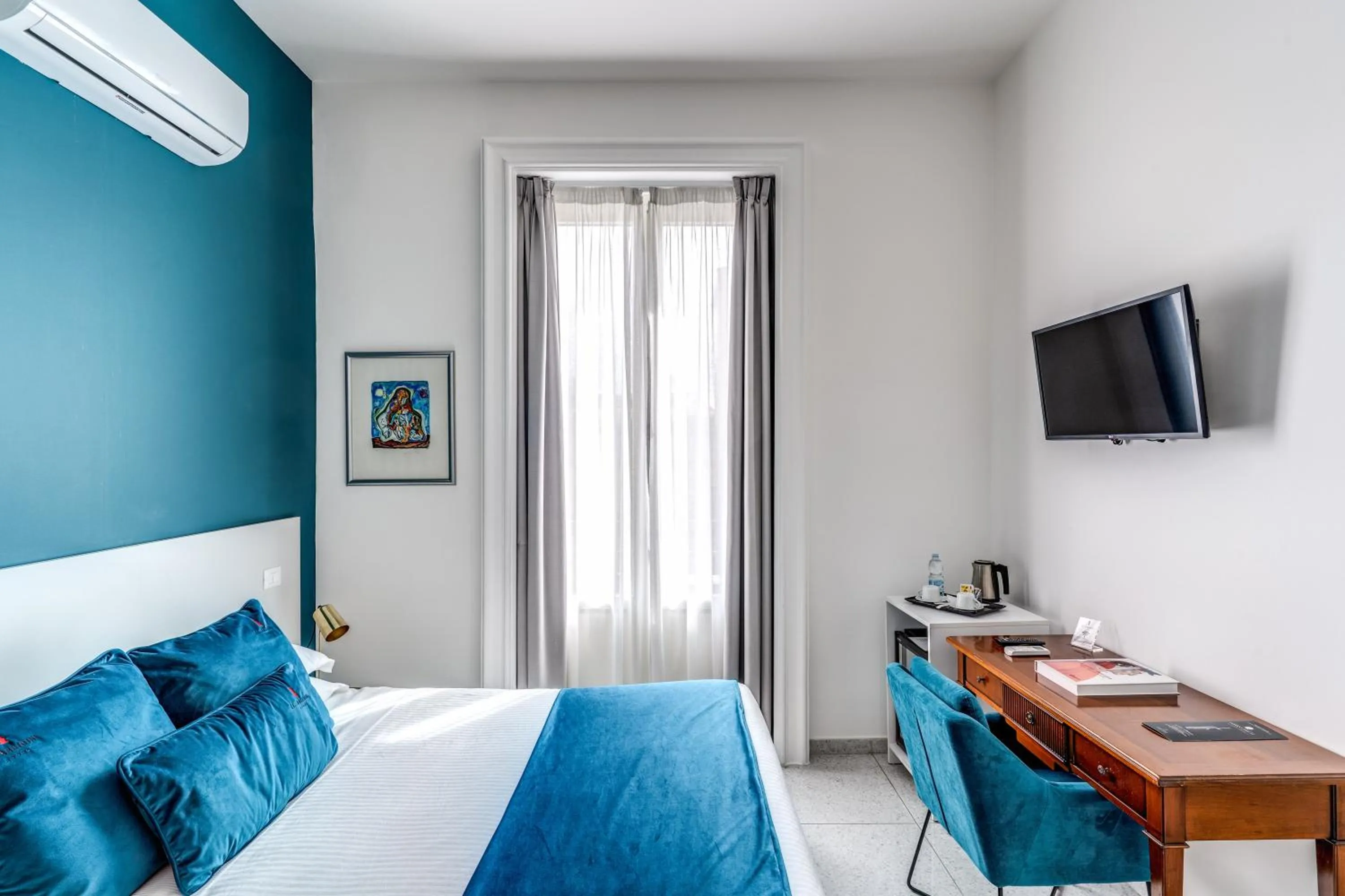 Bed in Le Angioine Rooms