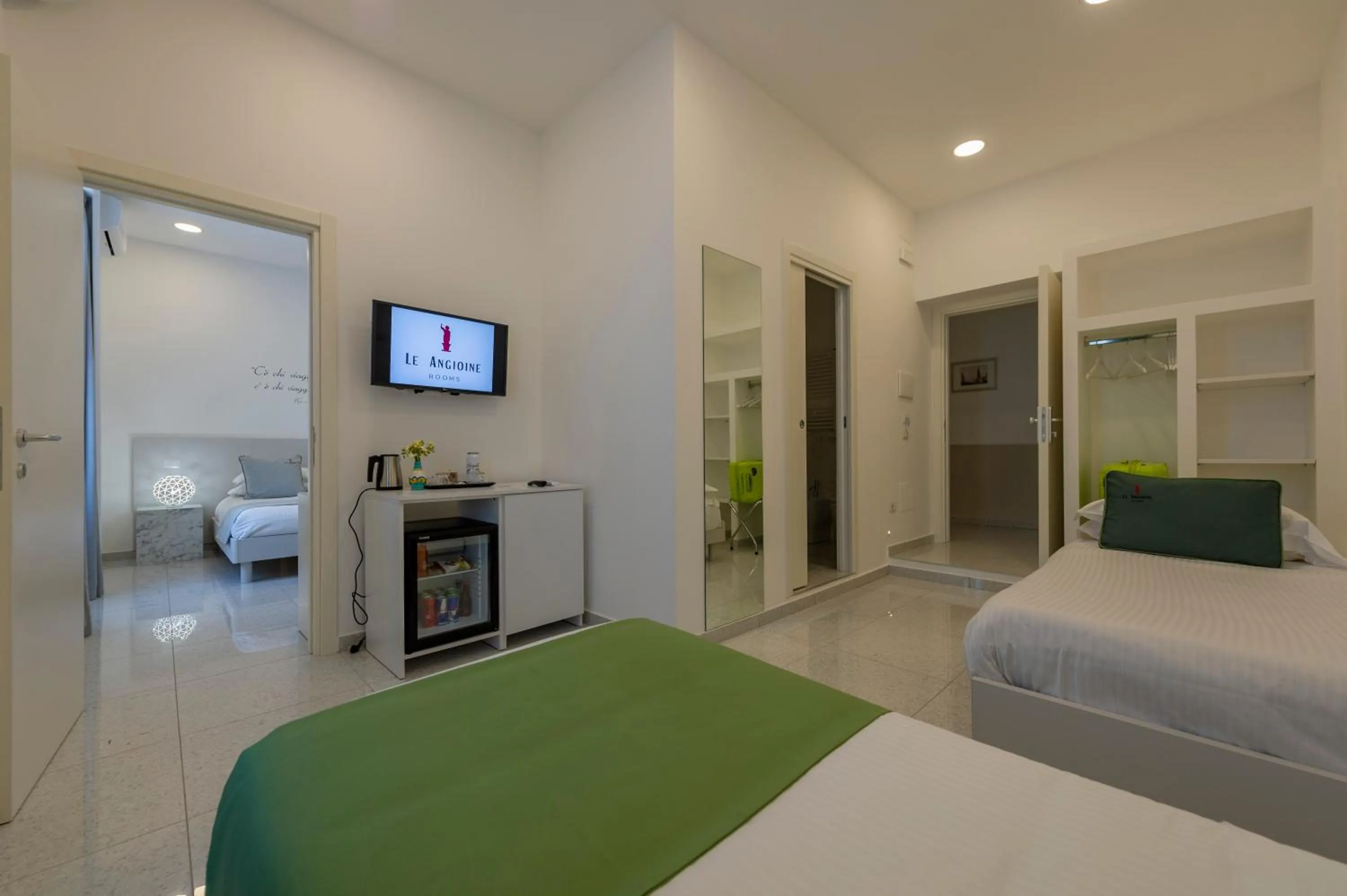 Bed in Le Angioine Rooms