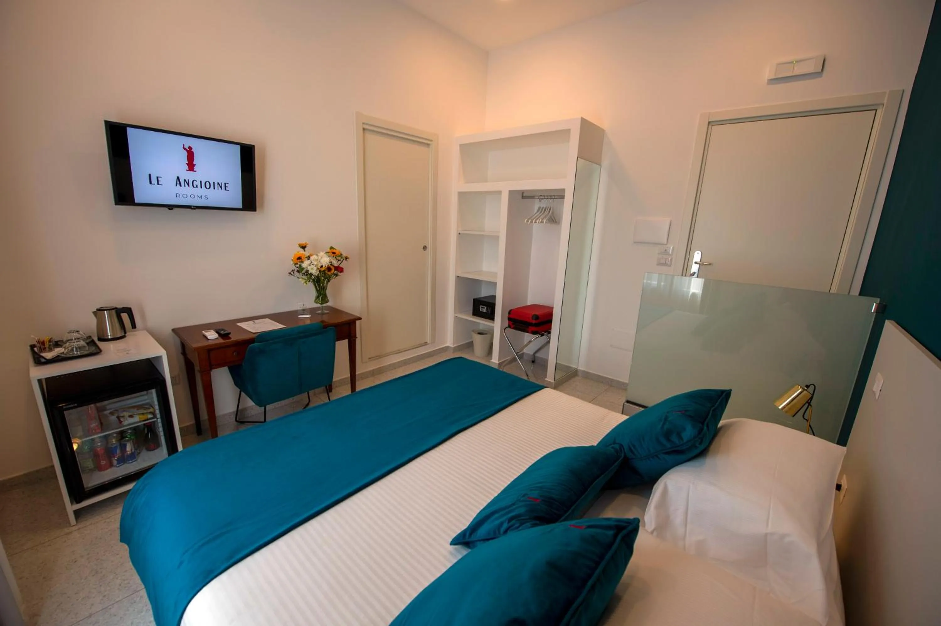 Bed in Le Angioine Rooms