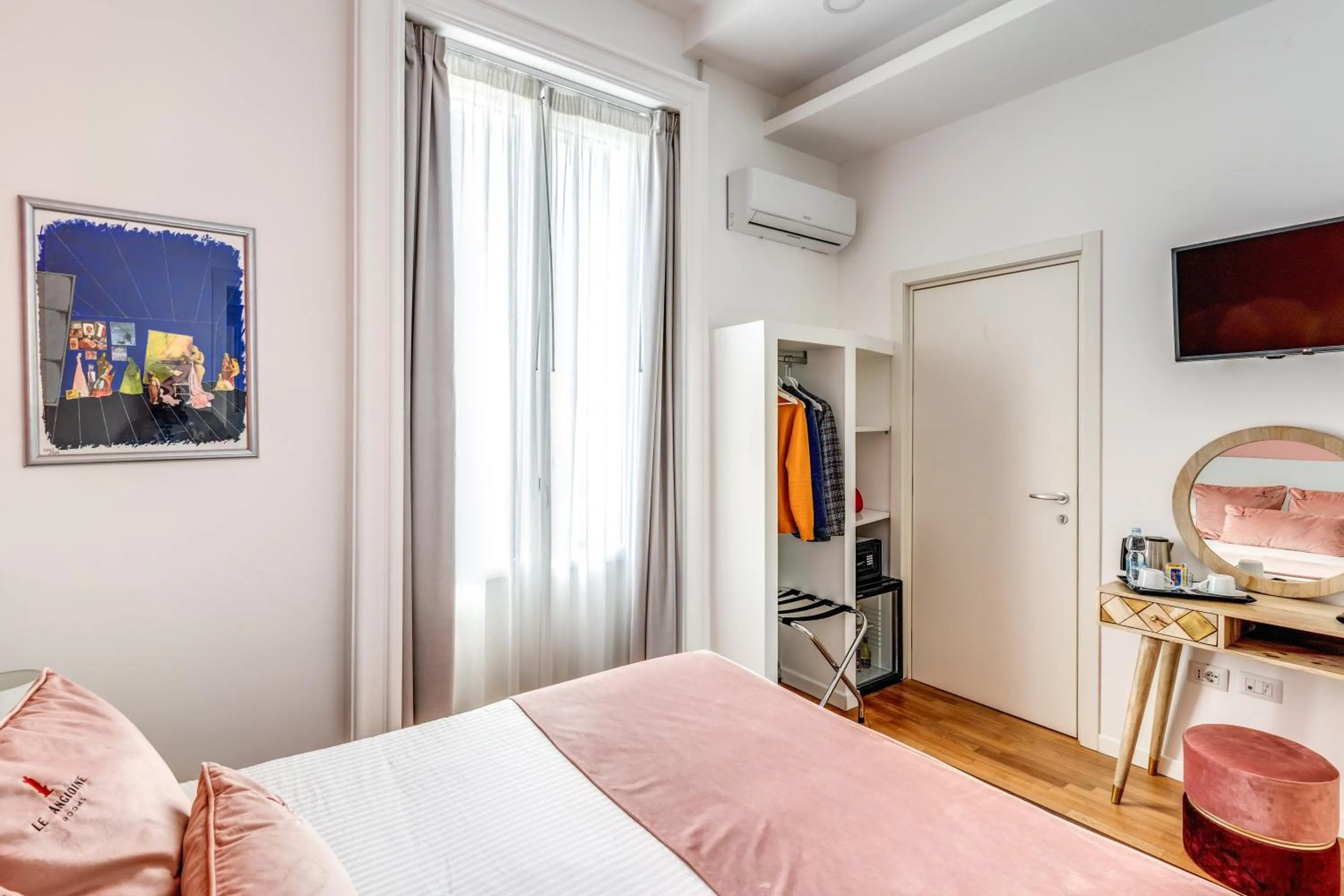 Bed in Le Angioine Rooms