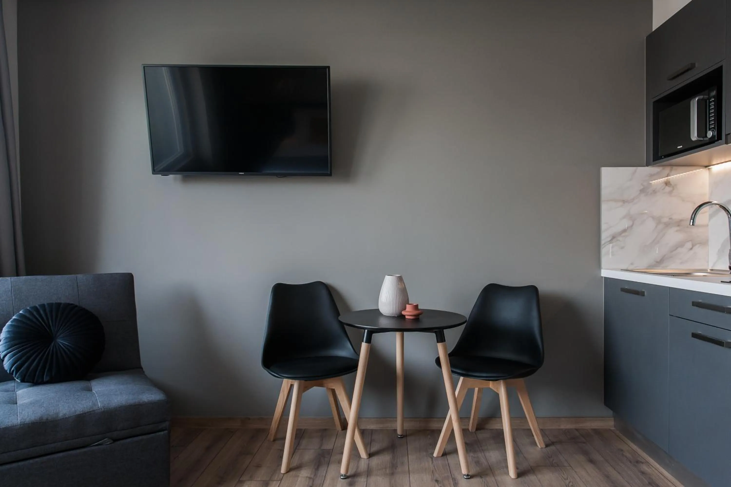 TV and multimedia in WYZ Athens Apartments by UPSTREET