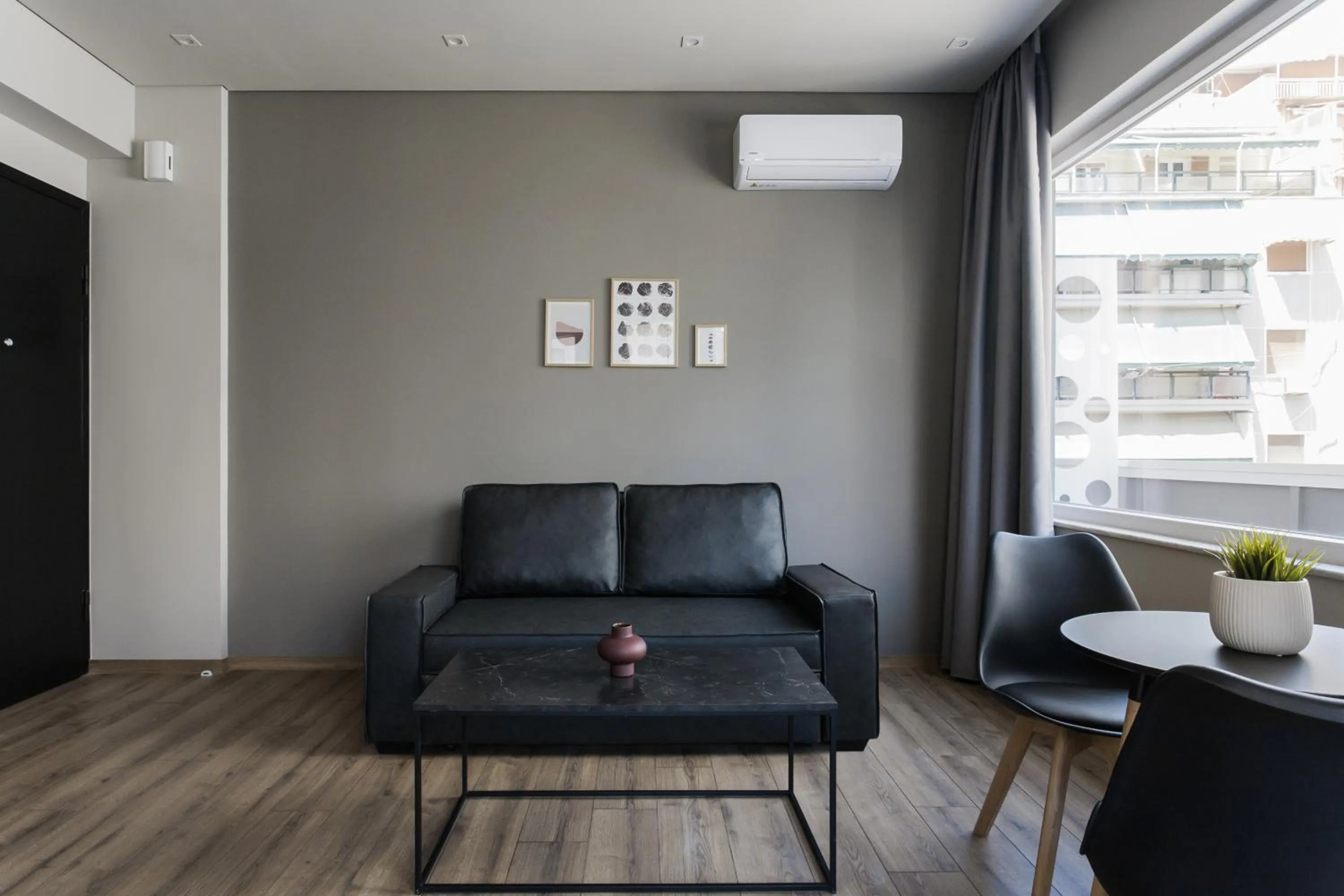 Living room in WYZ Athens Apartments by UPSTREET