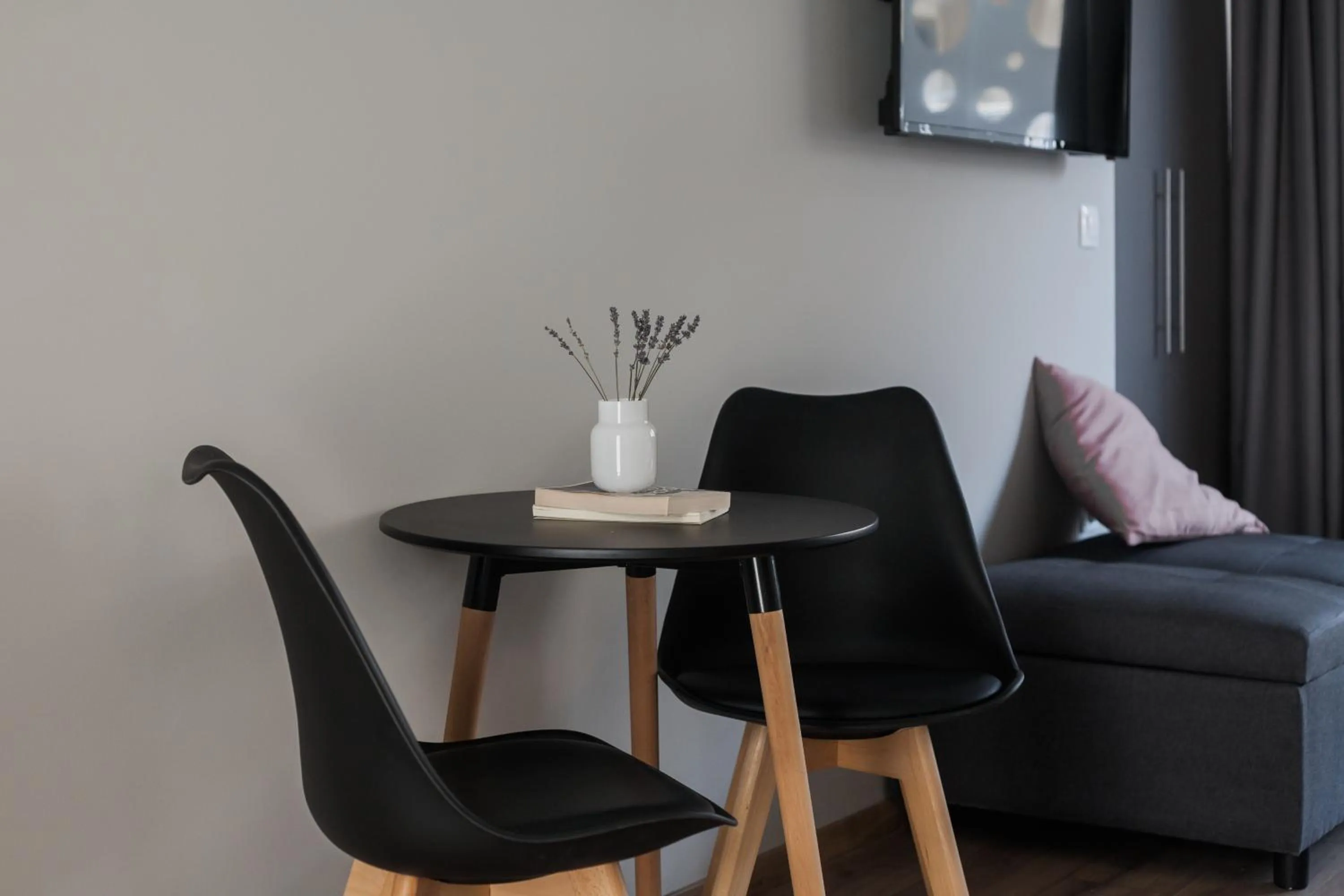 Seating area in WYZ Athens Apartments by UPSTREET