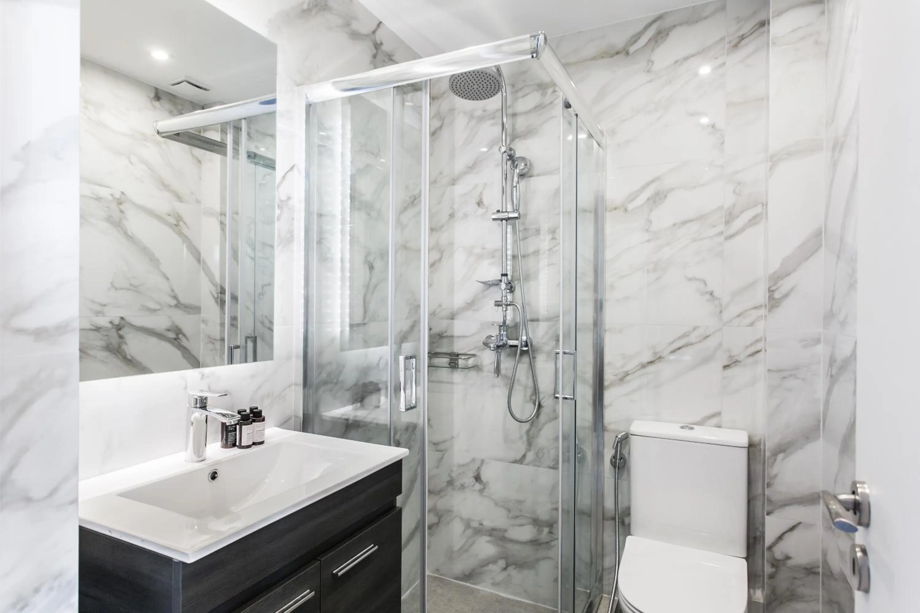 Shower in WYZ Athens Apartments by UPSTREET