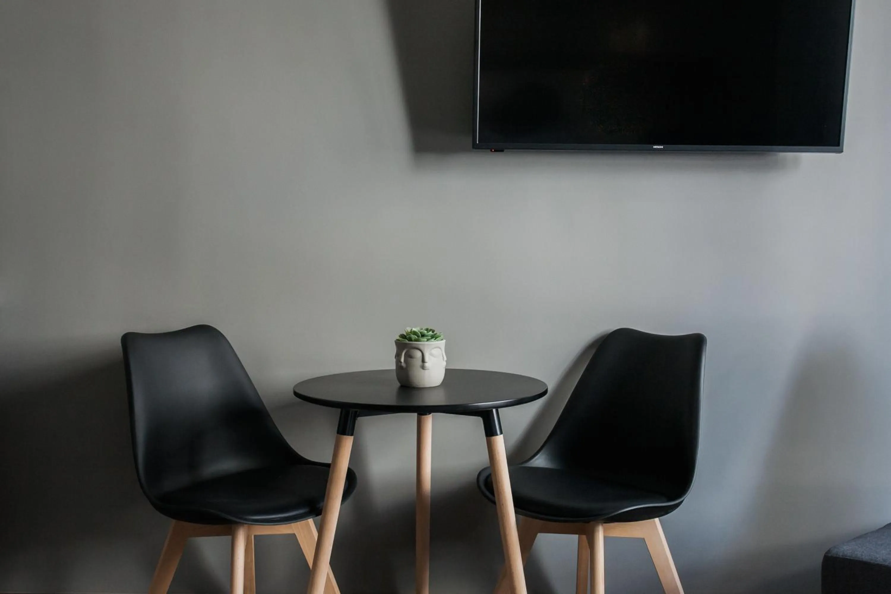 Seating area in WYZ Athens Apartments by UPSTREET