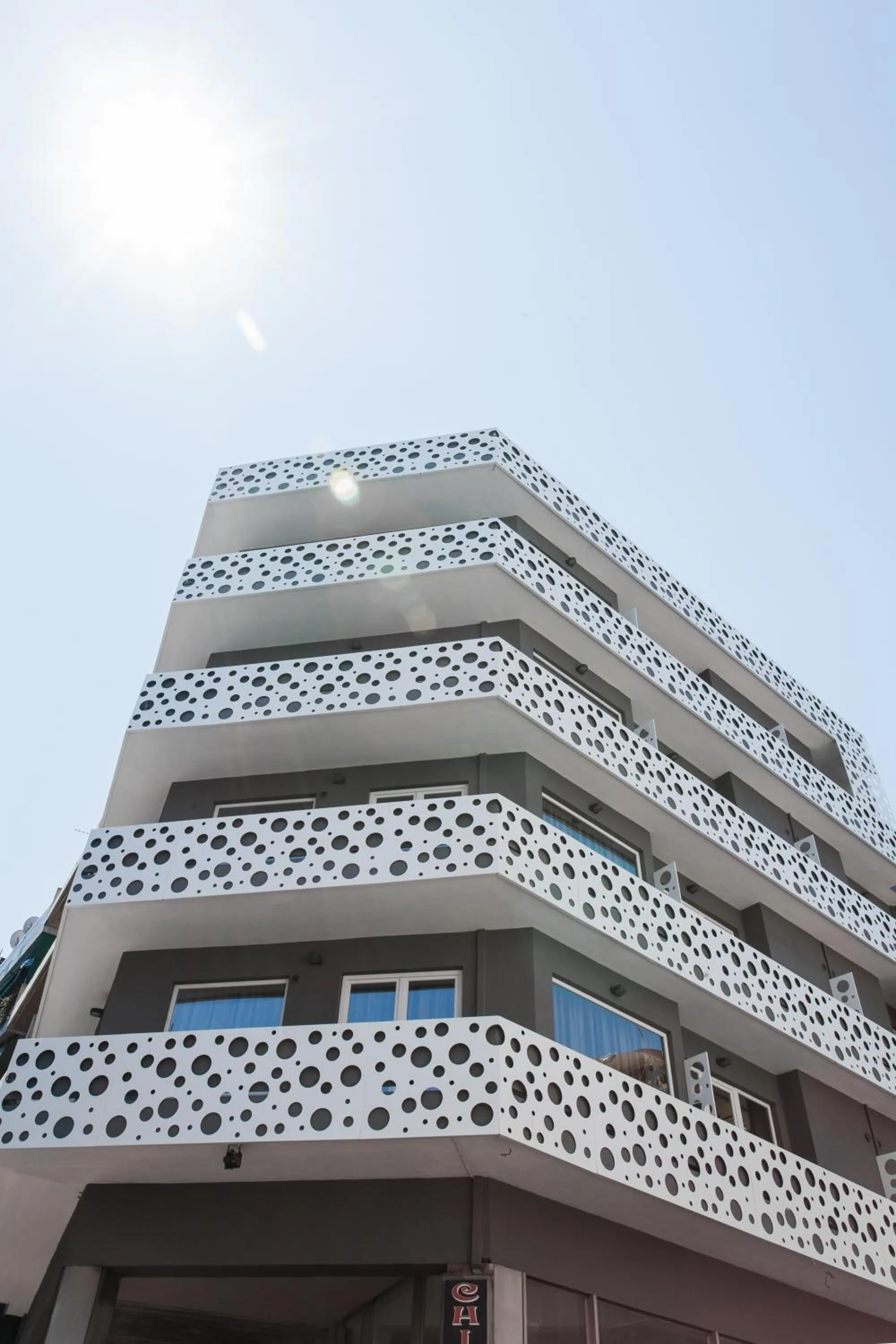 Property building in WYZ Athens Apartments by UPSTREET