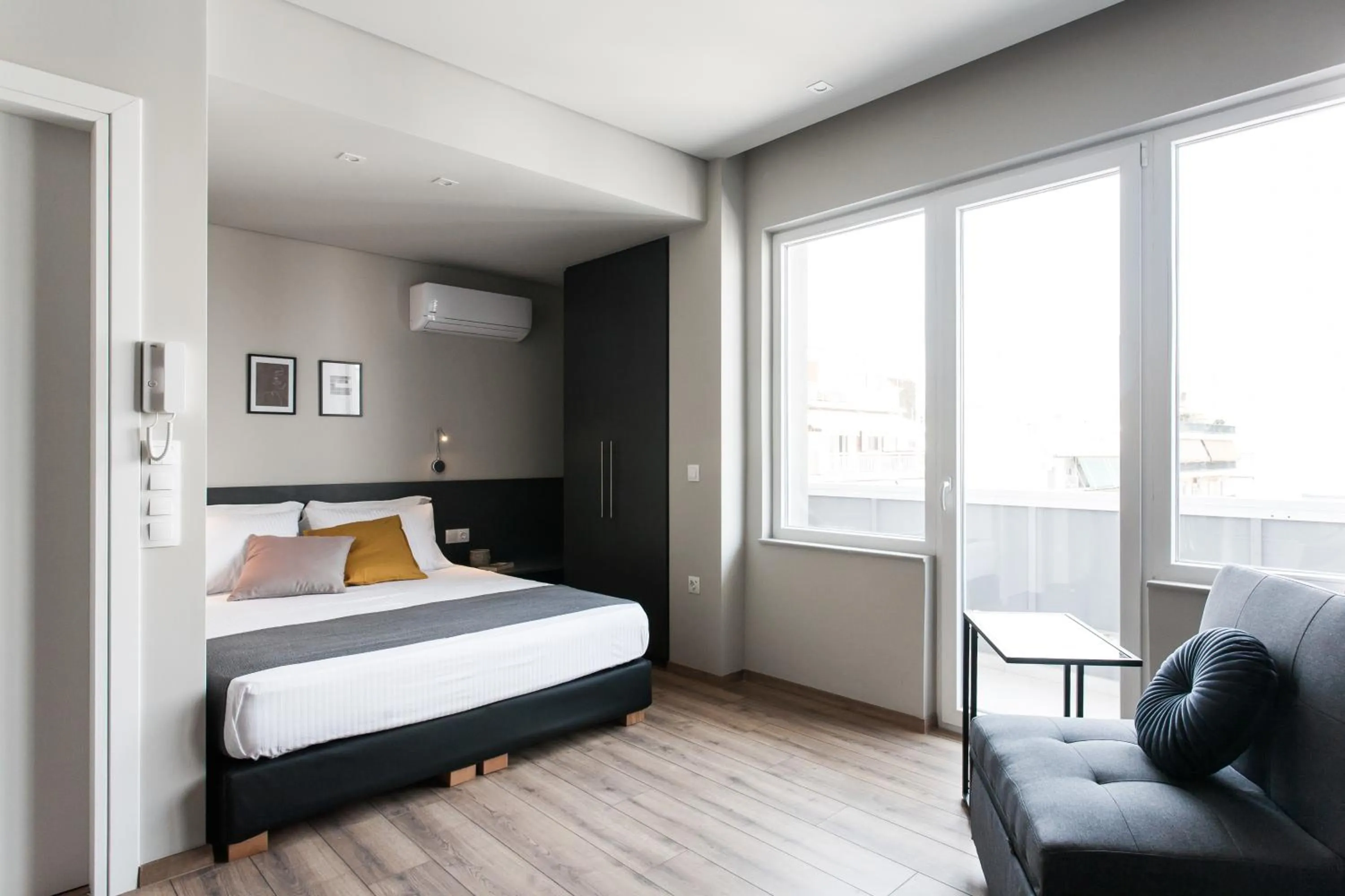 Bed in WYZ Athens Apartments by UPSTREET