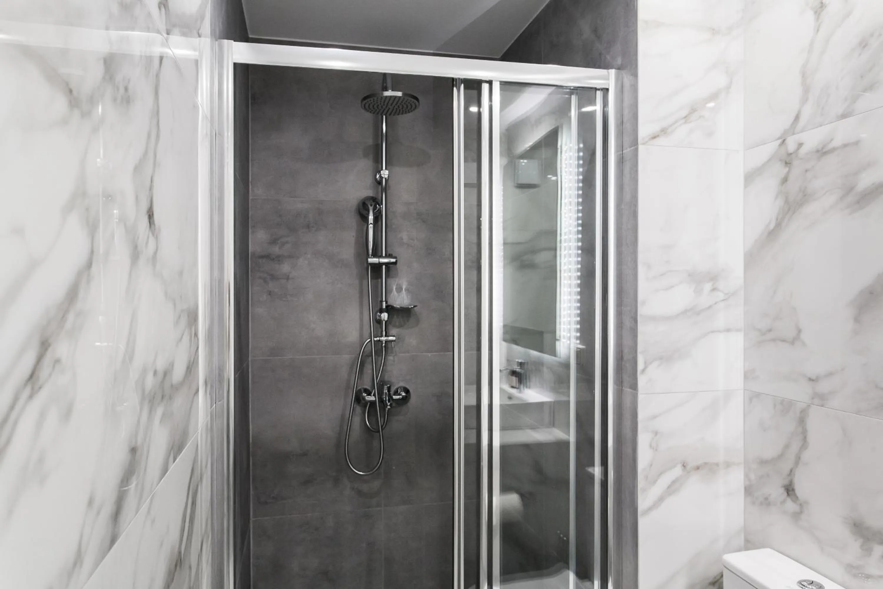 Shower in WYZ Athens Apartments by UPSTREET