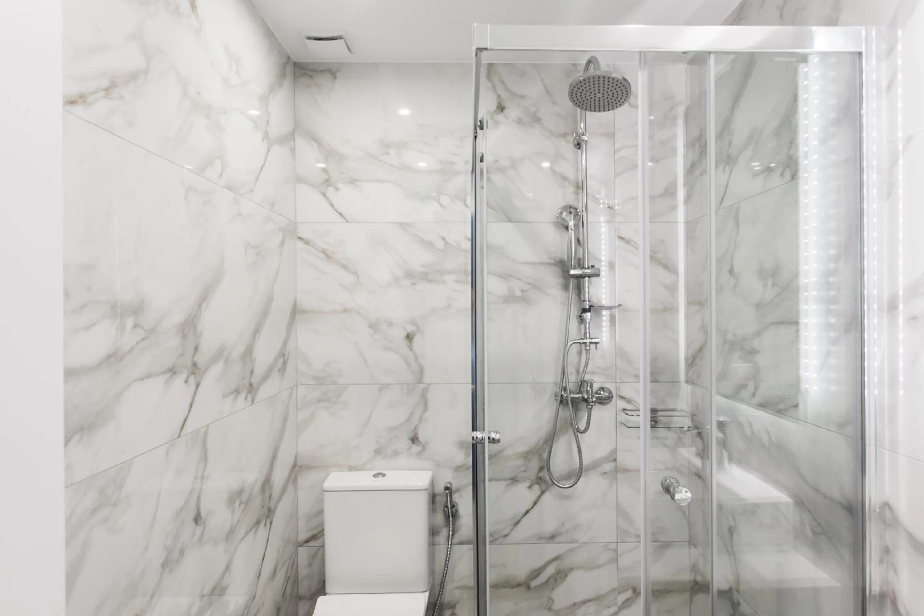 Shower in WYZ Athens Apartments by UPSTREET