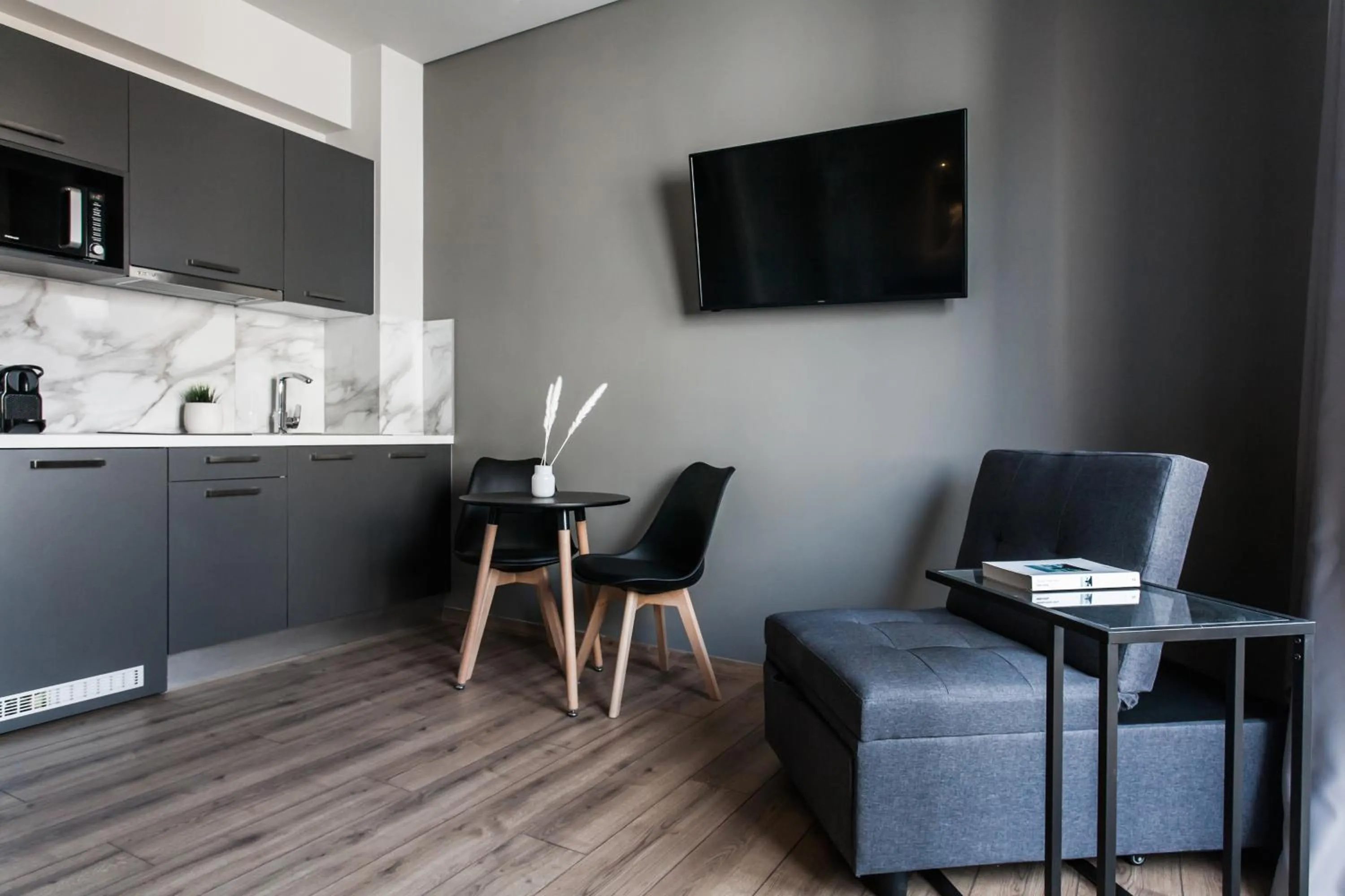 TV and multimedia in WYZ Athens Apartments by UPSTREET
