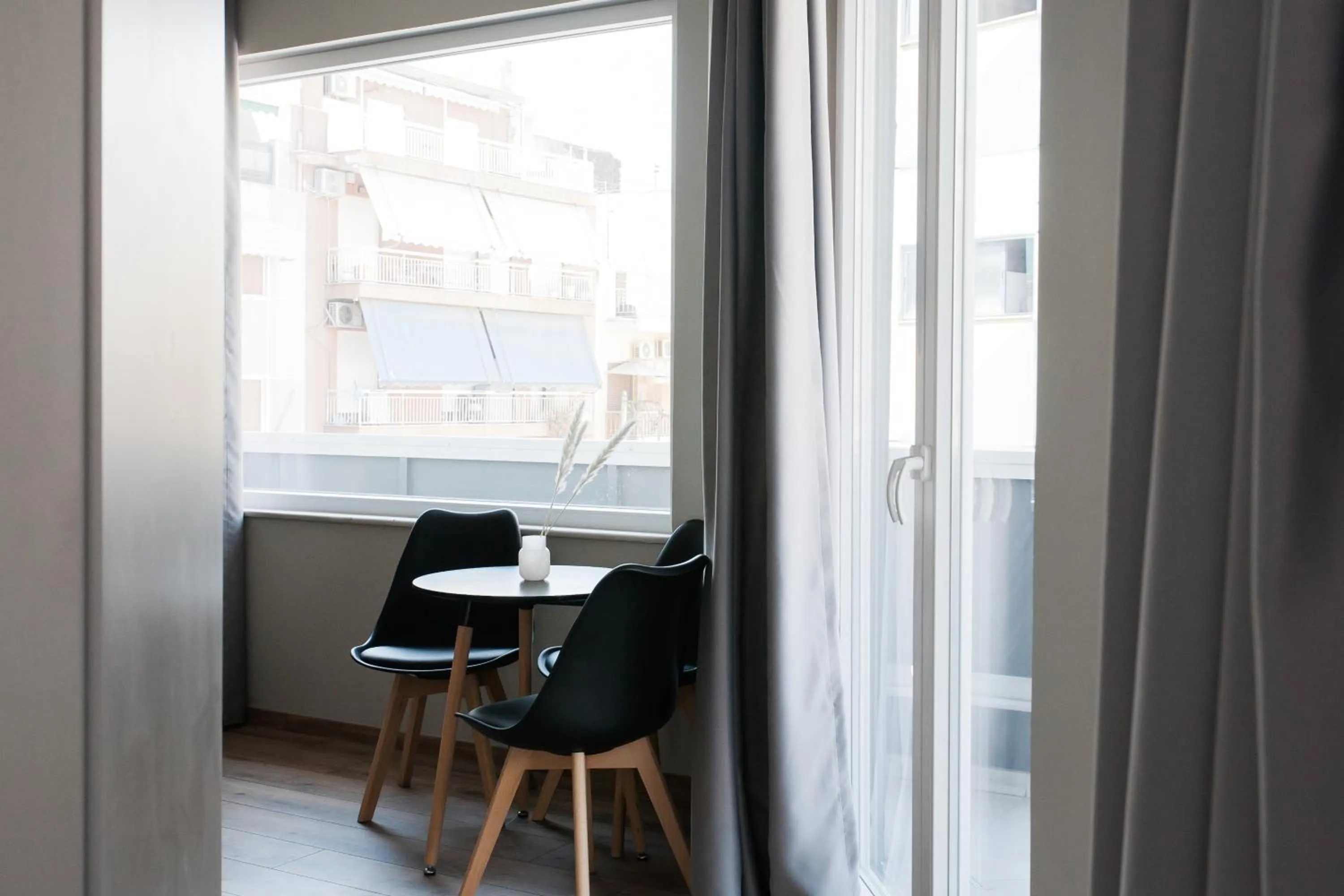 Seating area in WYZ Athens Apartments by UPSTREET