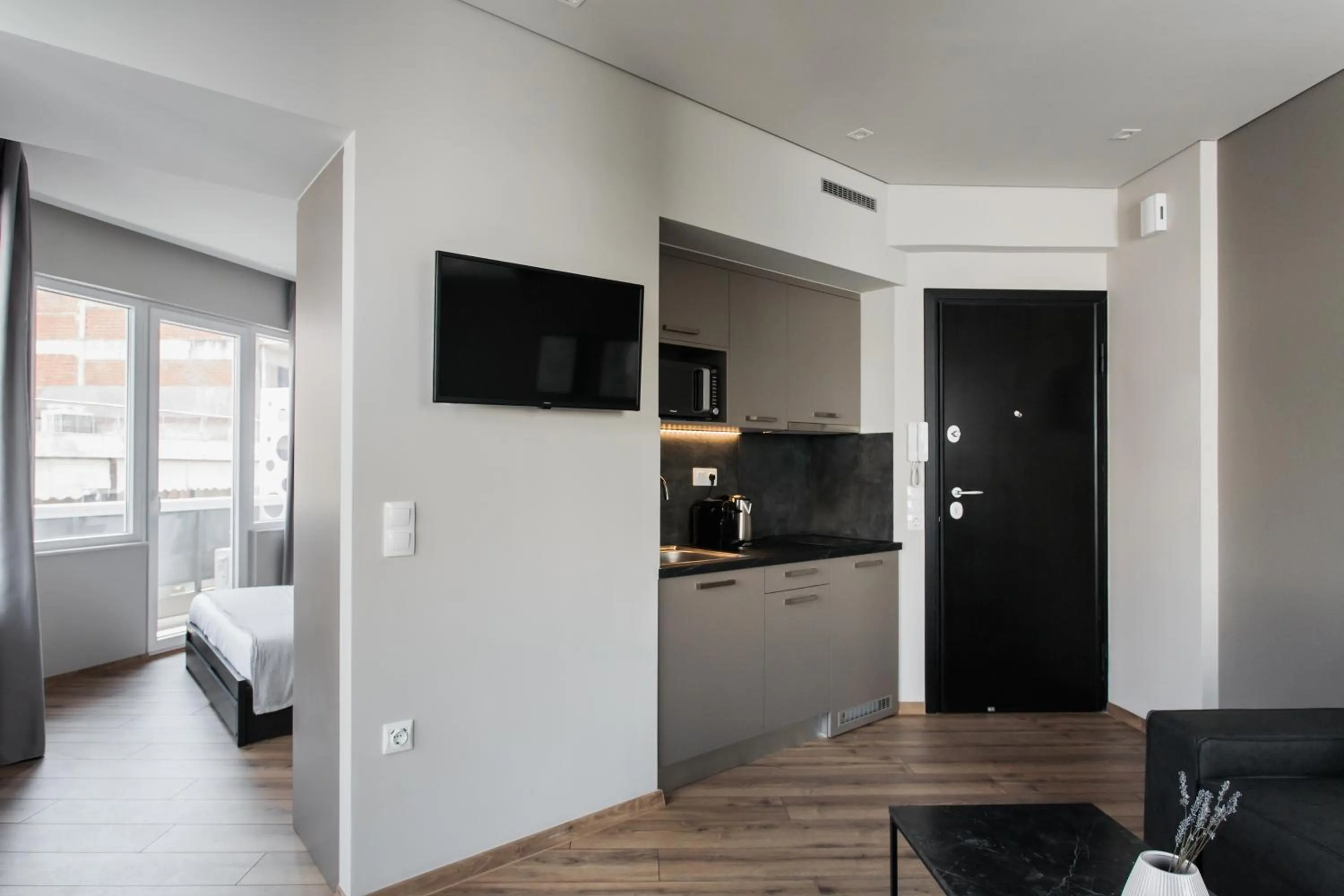 Bed in WYZ Athens Apartments by UPSTREET