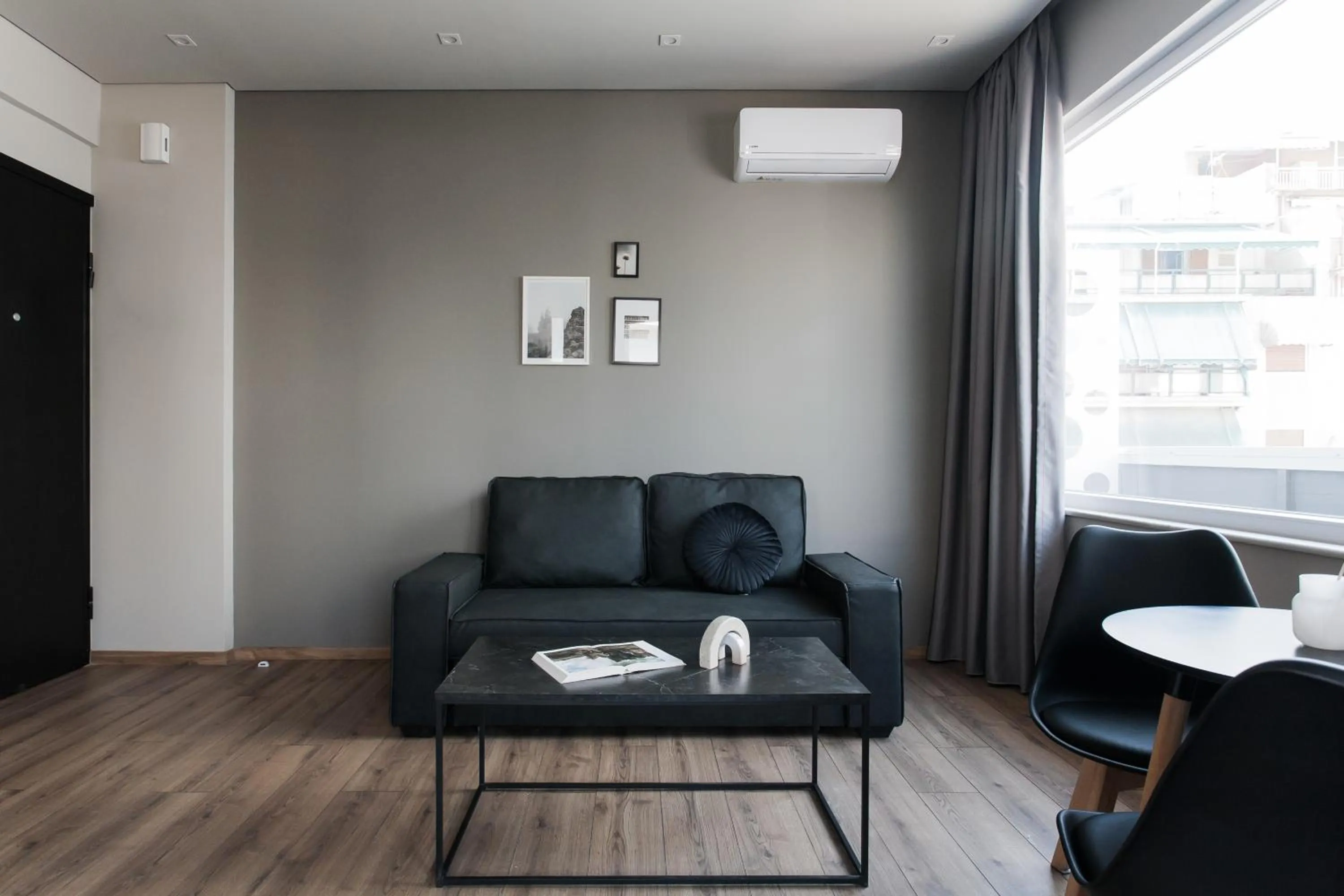 Living room in WYZ Athens Apartments by UPSTREET