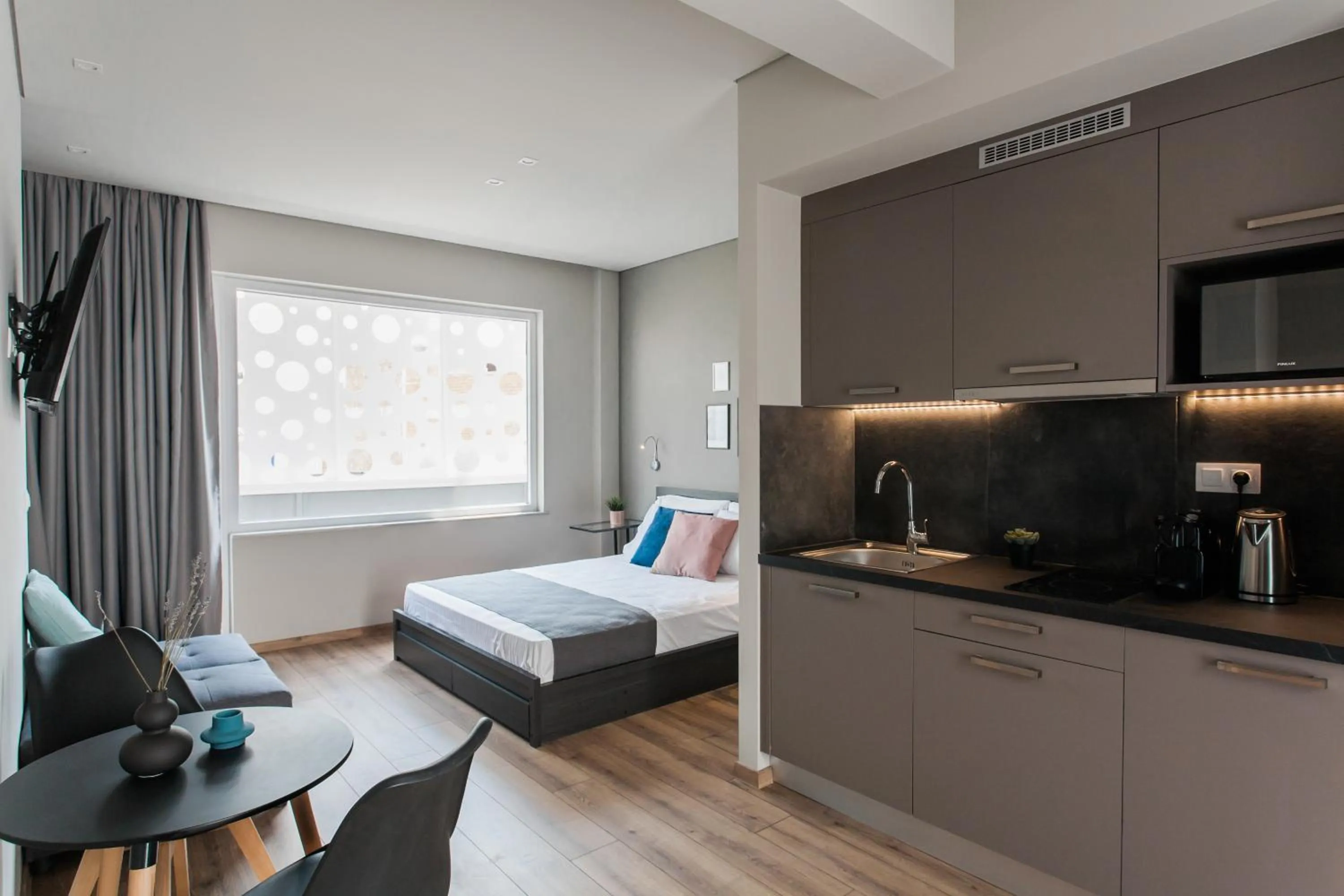 Bed in WYZ Athens Apartments by UPSTREET