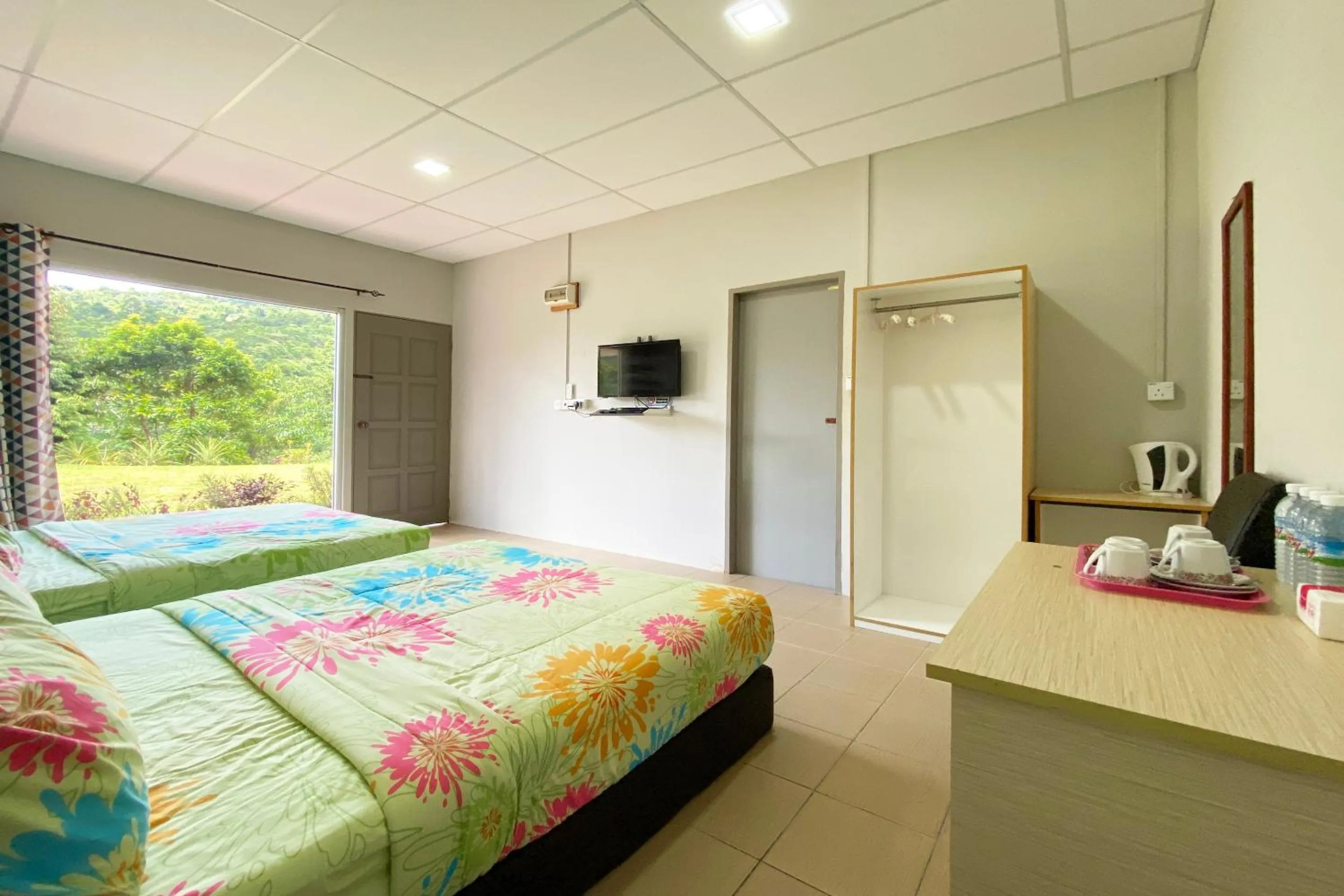 Photo of the whole room, Bed in Hotel O Tambunan Nature Lodge