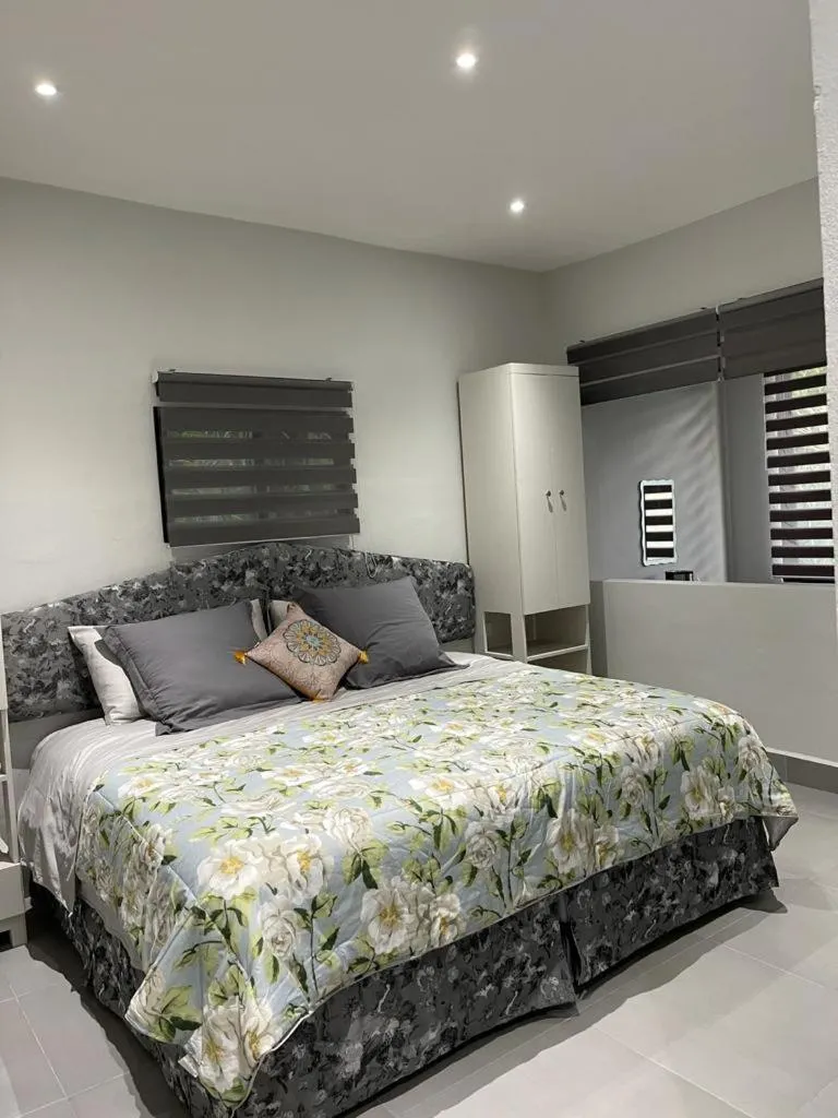 Bed in The Blue Eco Lodge