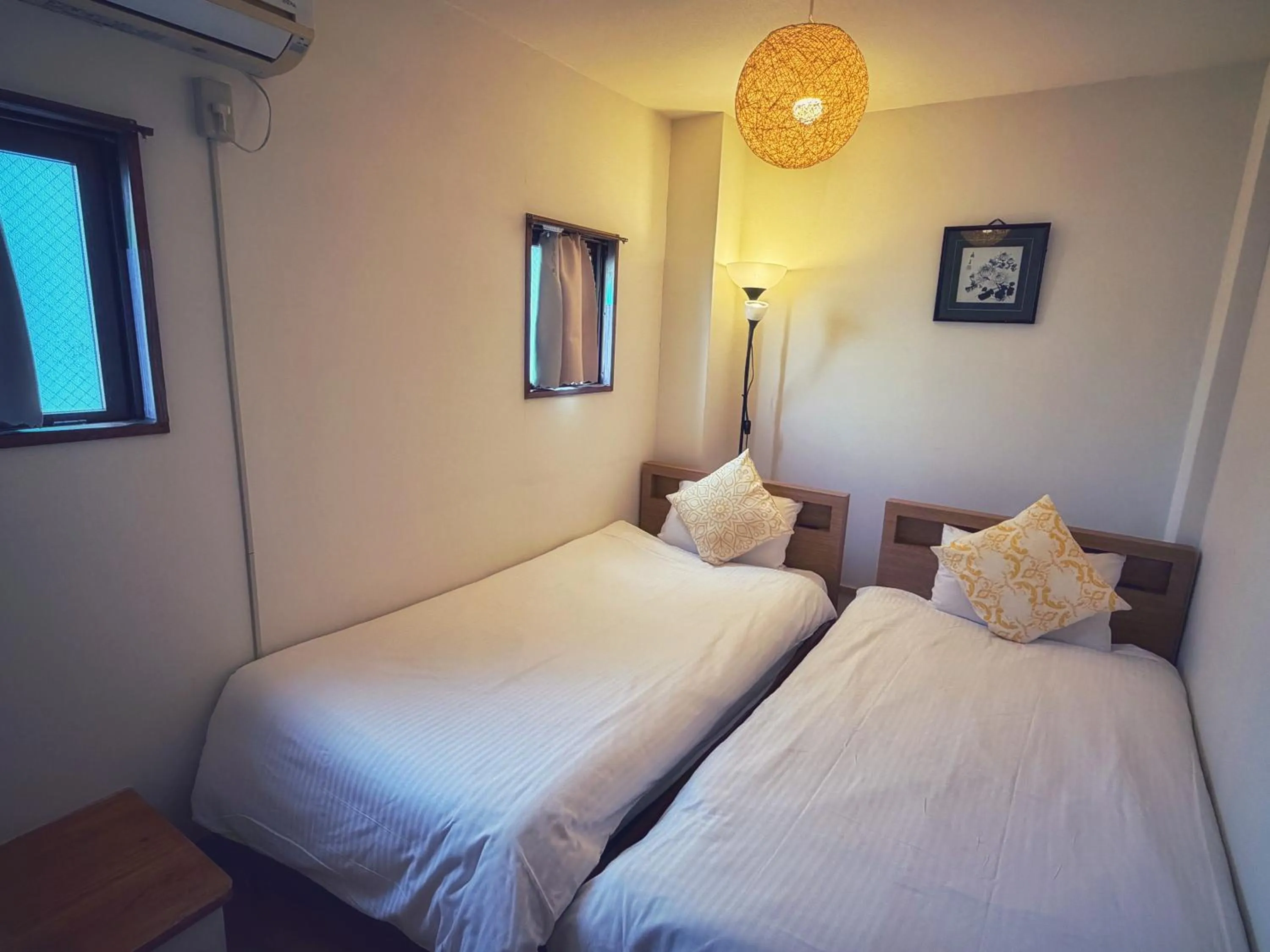 Bed in Uhome Ueno Hotel