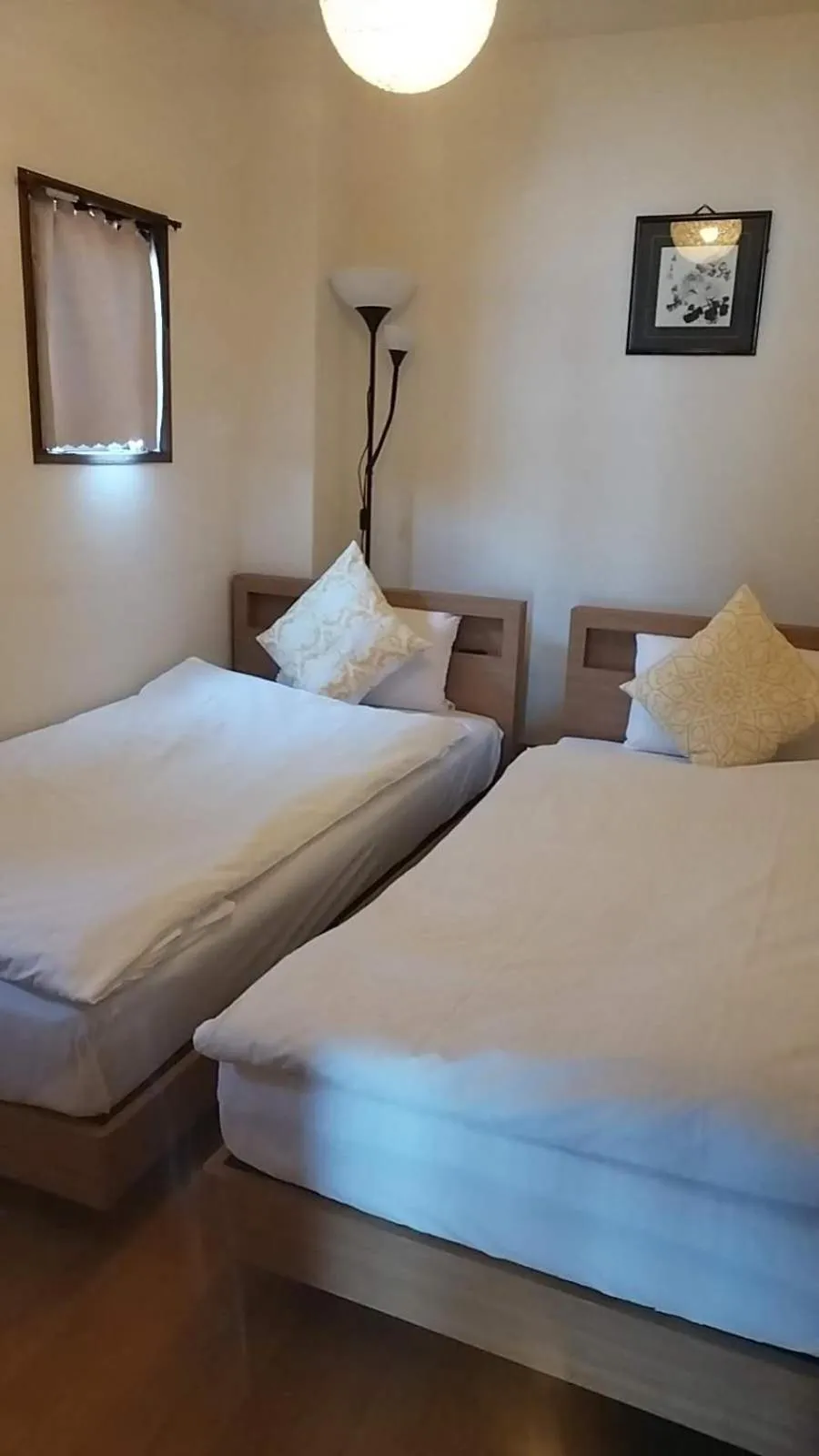 Bed in Uhome Ueno Hotel