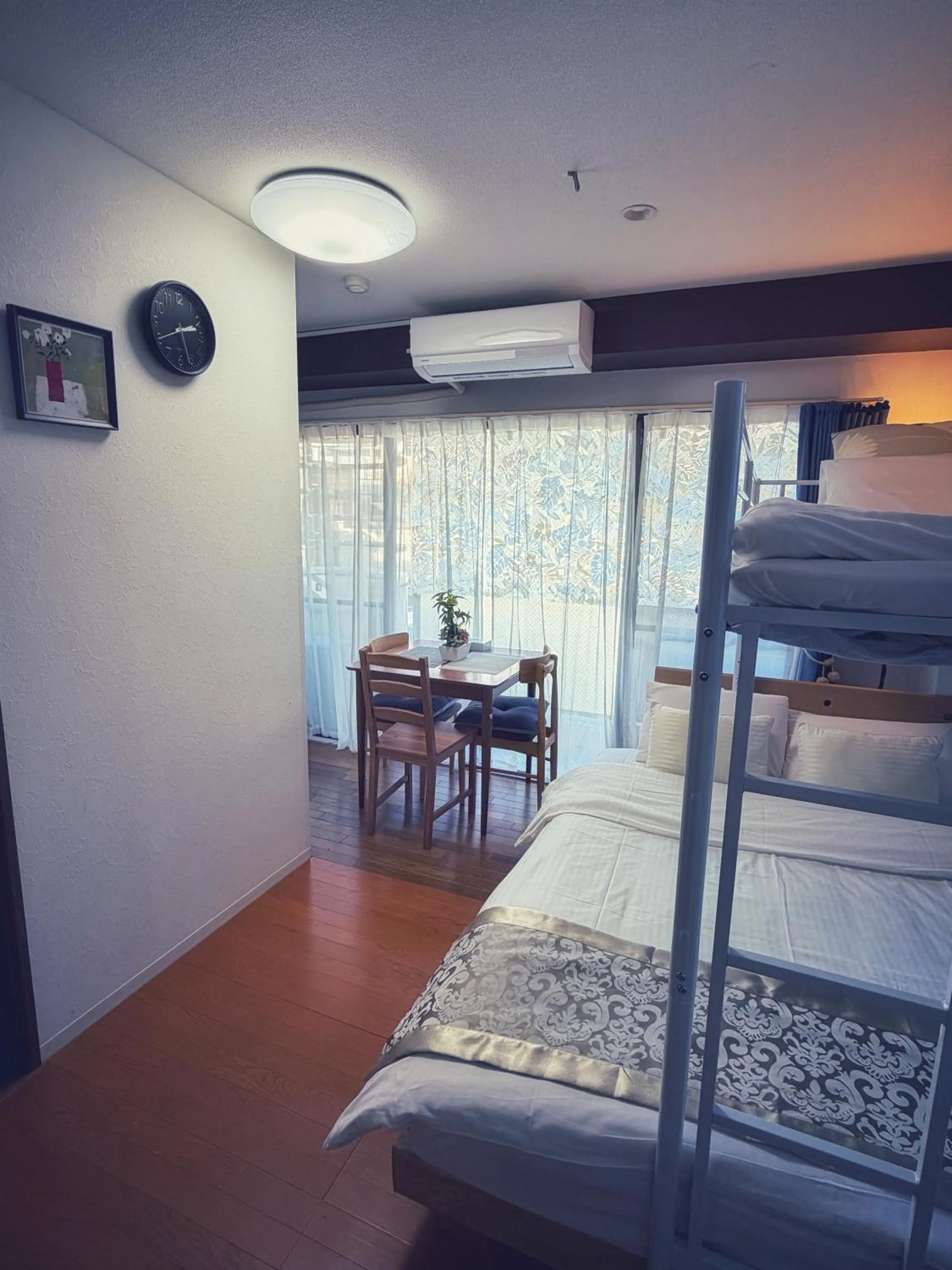 Bed in Uhome Ueno Hotel