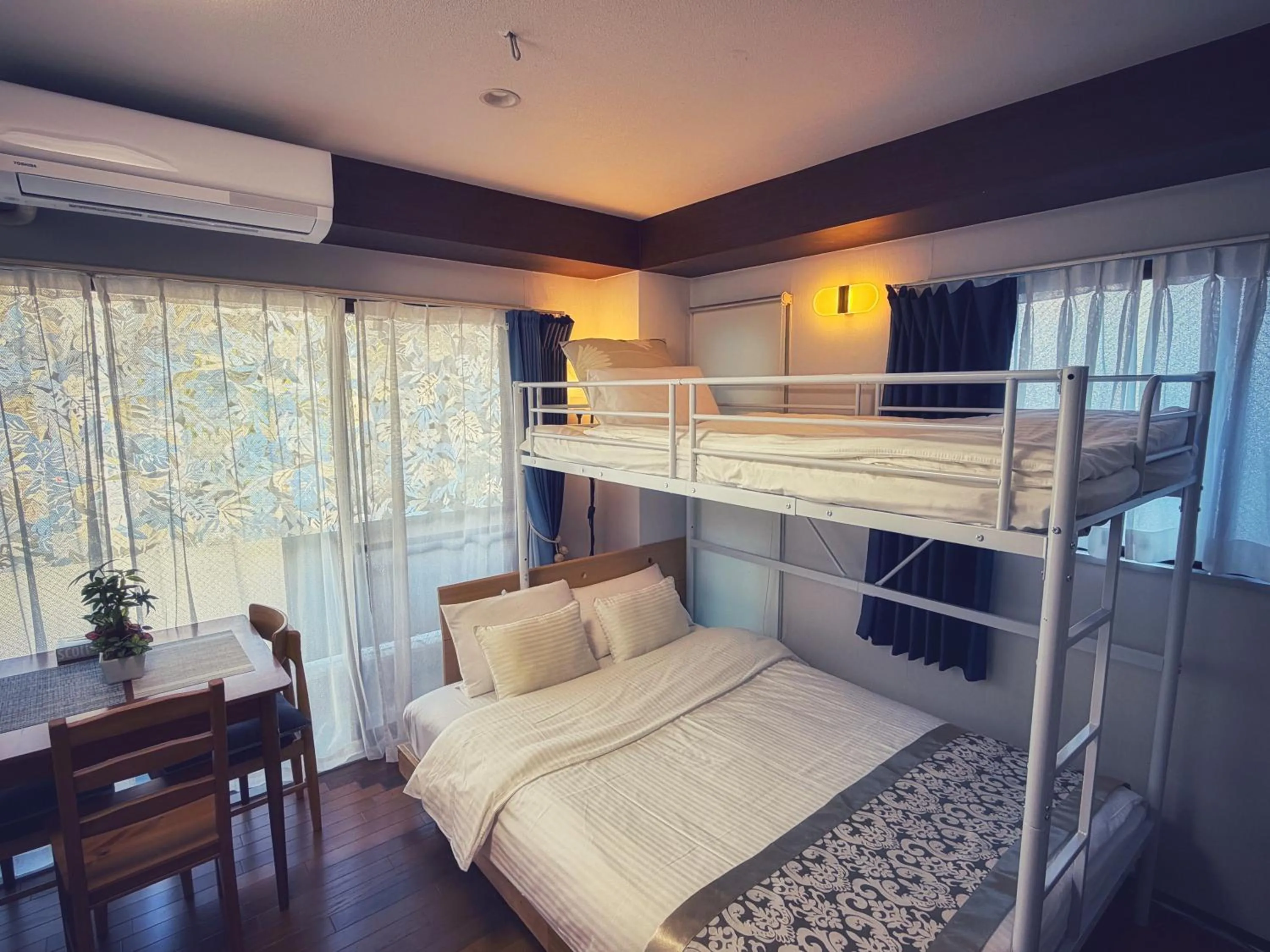 Bed in Uhome Ueno Hotel