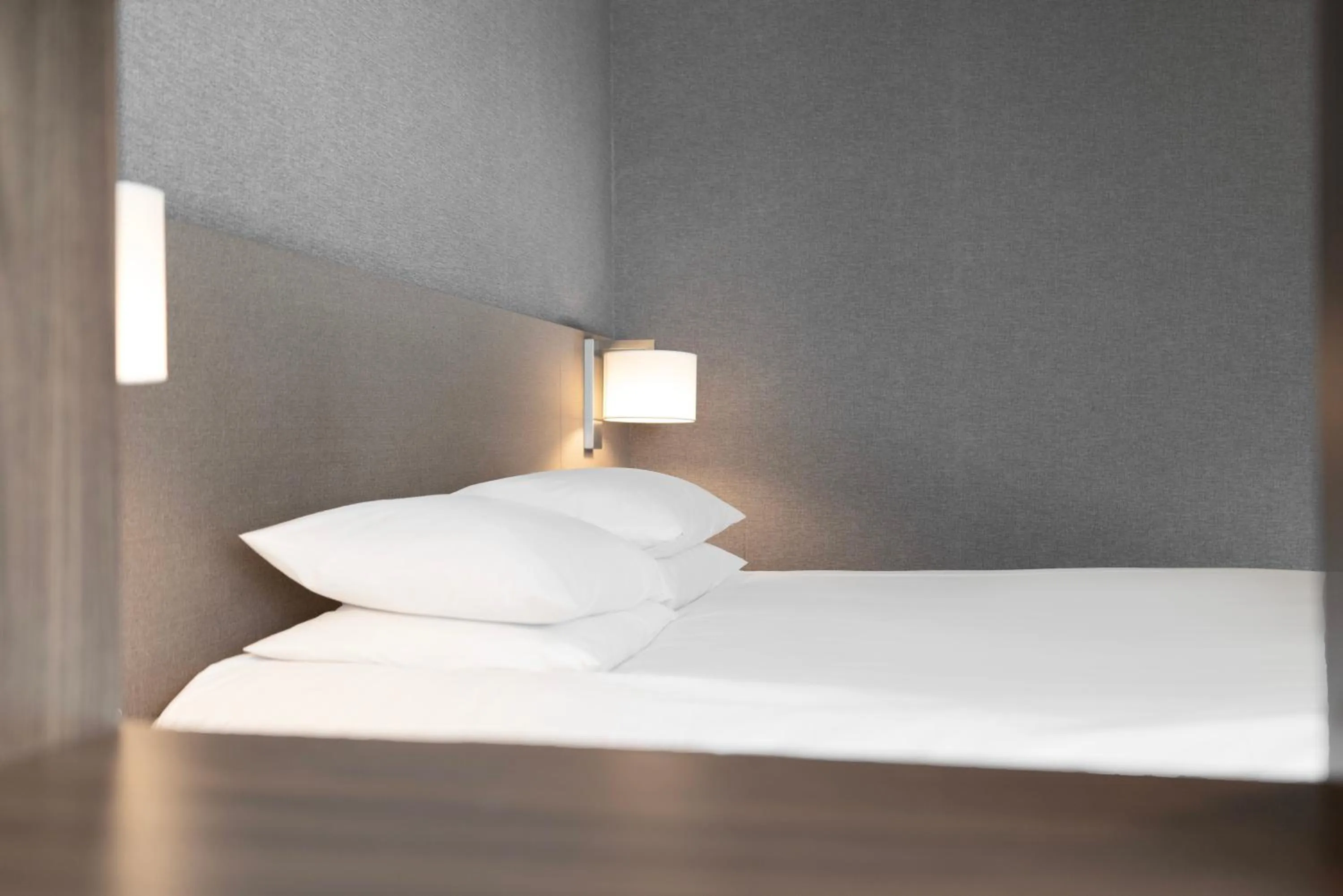 Bed in Northharbor Hotel