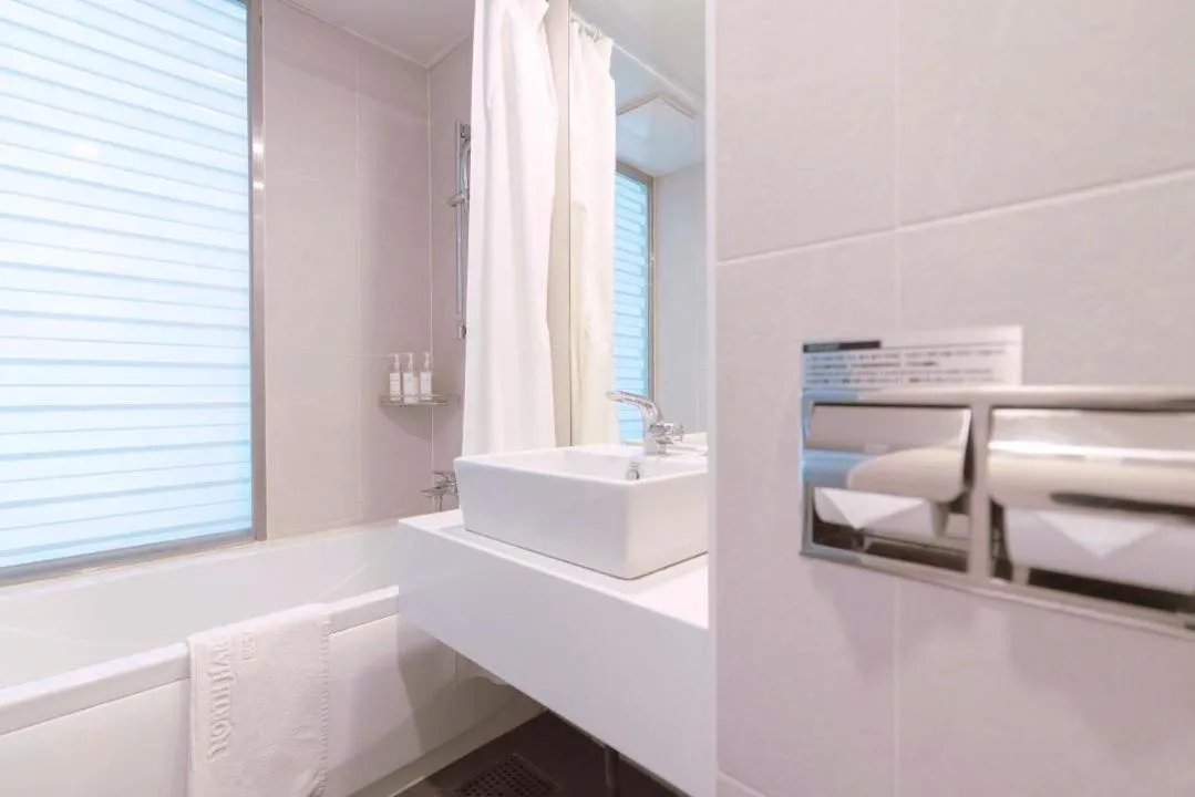 Bed in Northharbor Hotel