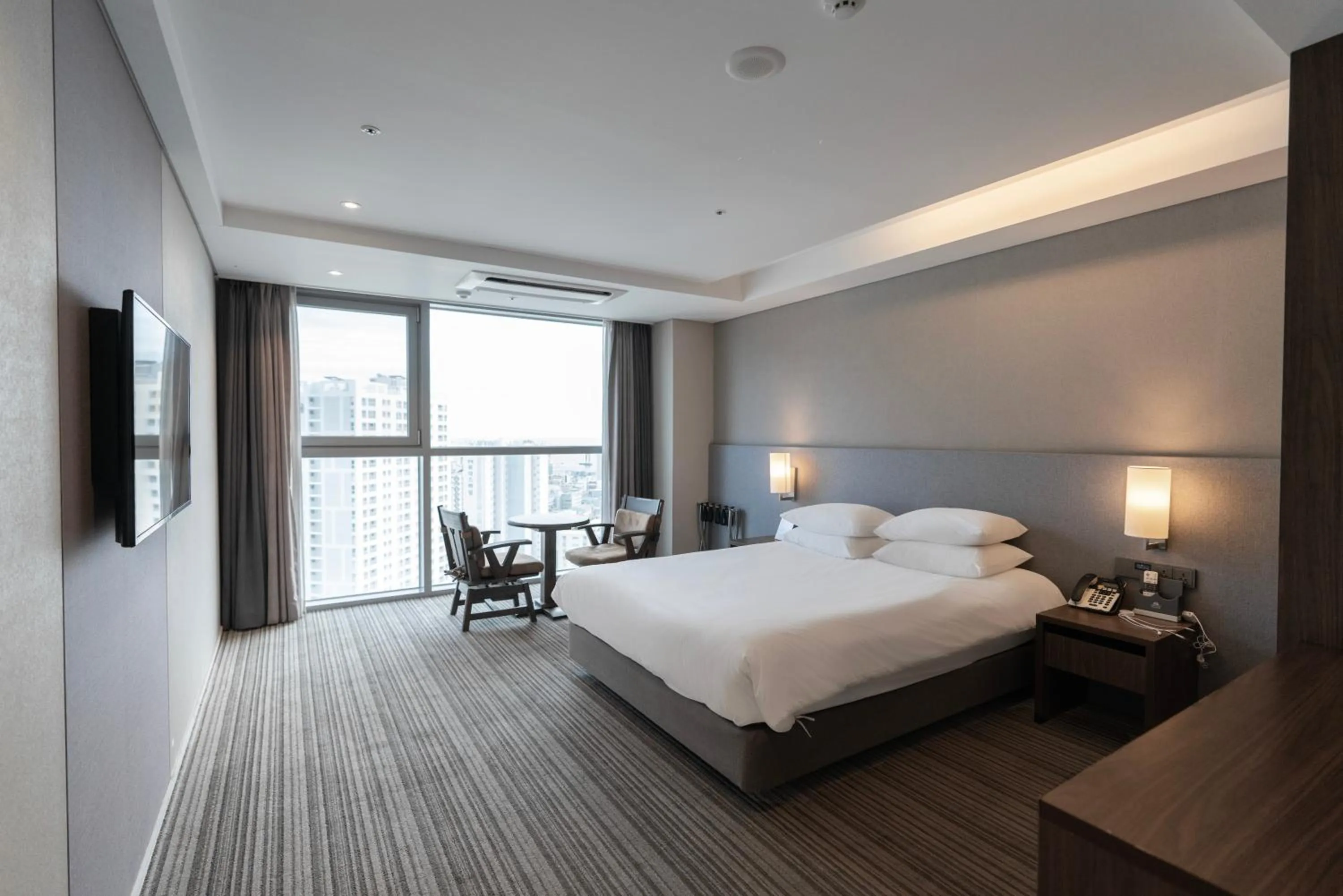 Bed in Northharbor Hotel