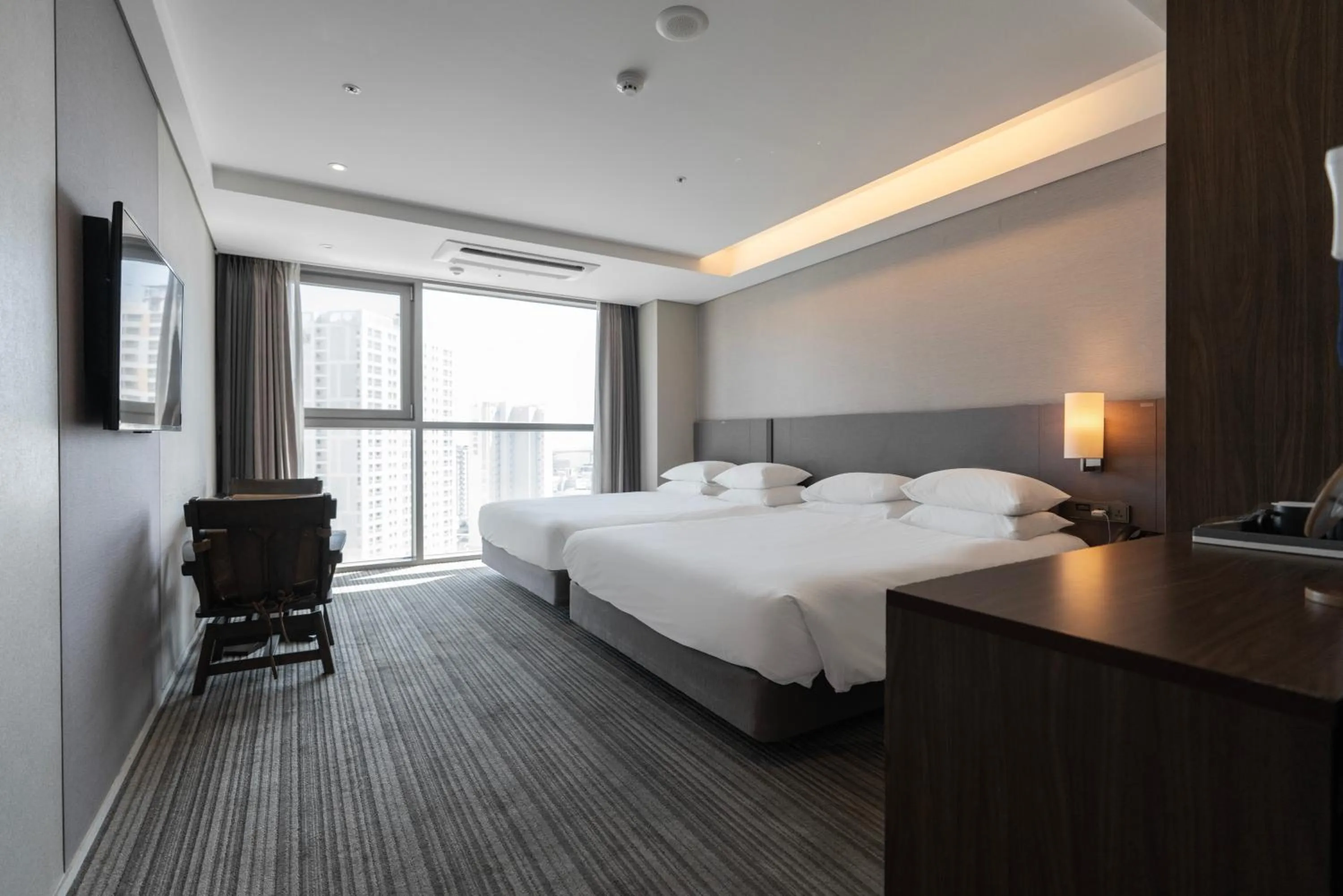 Bed in Northharbor Hotel