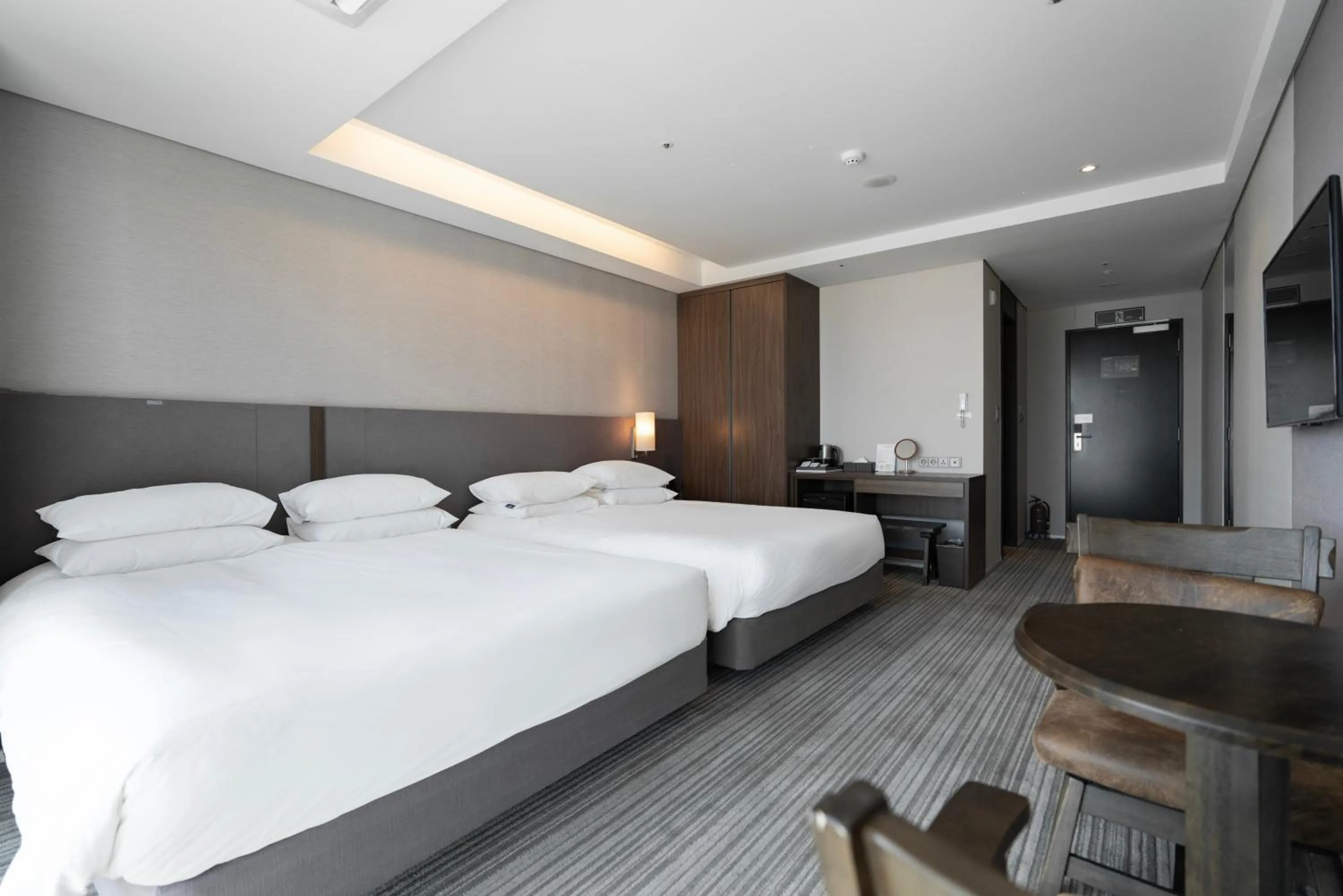 Bed in Northharbor Hotel