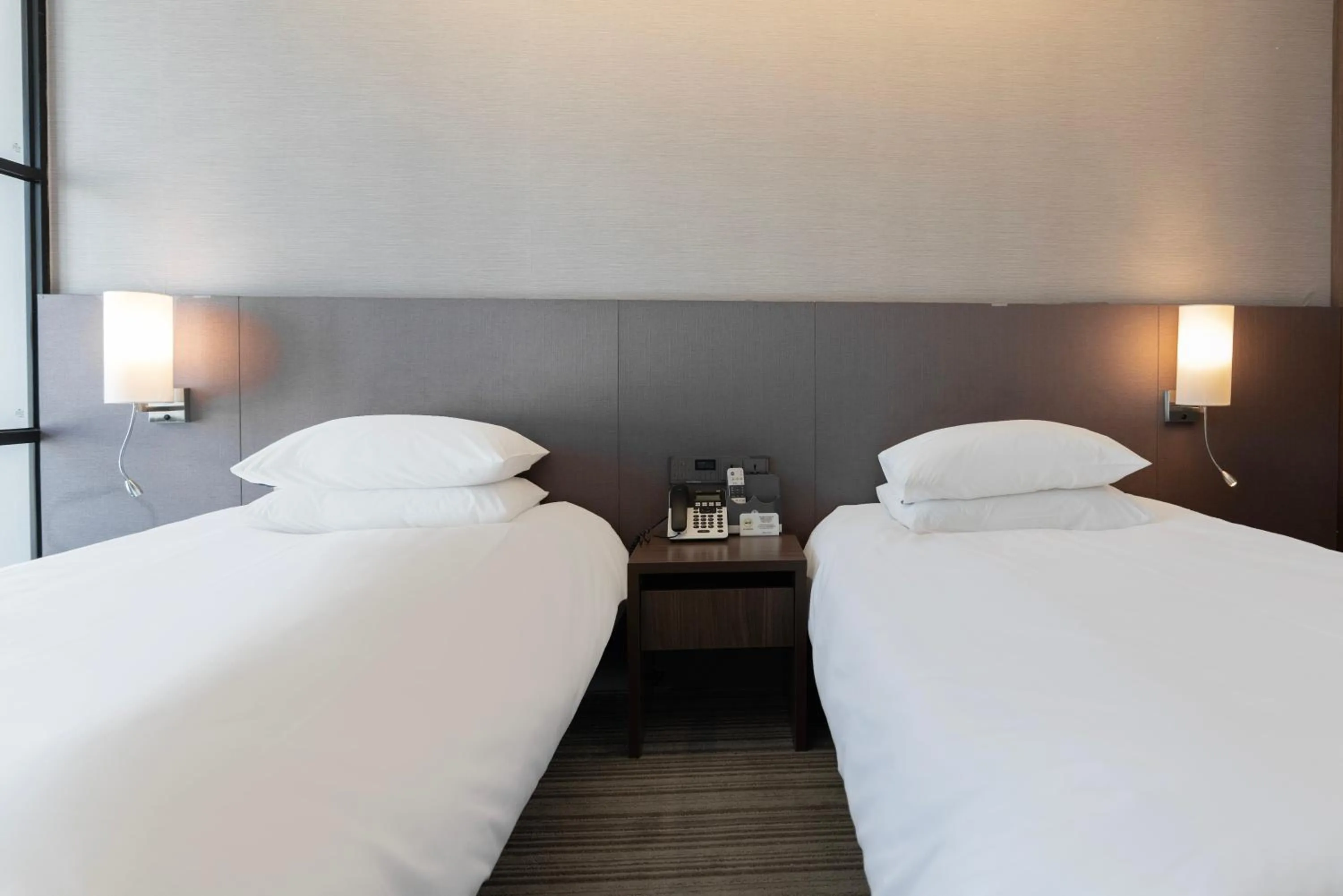 Bed in Northharbor Hotel