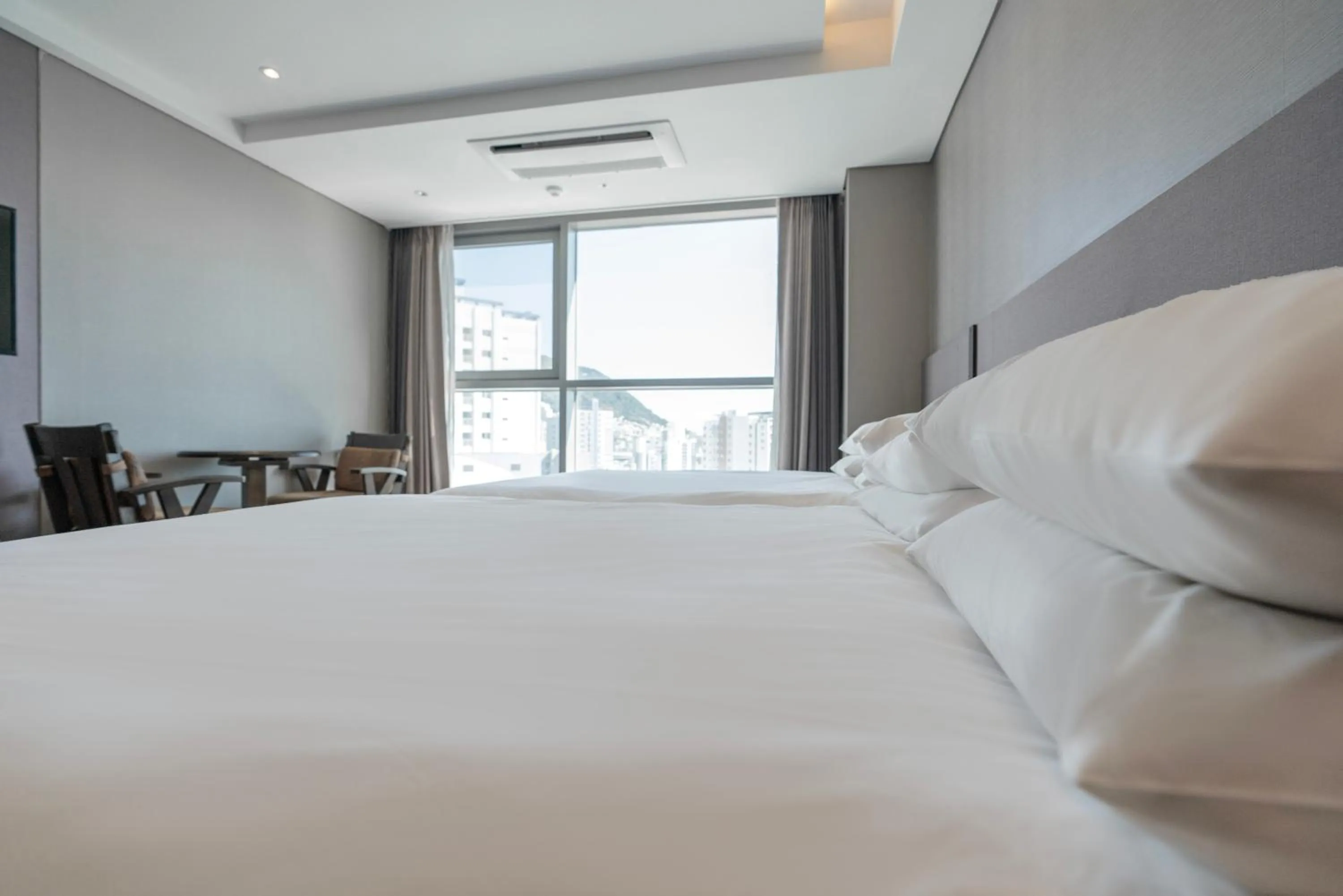 Bed in Northharbor Hotel