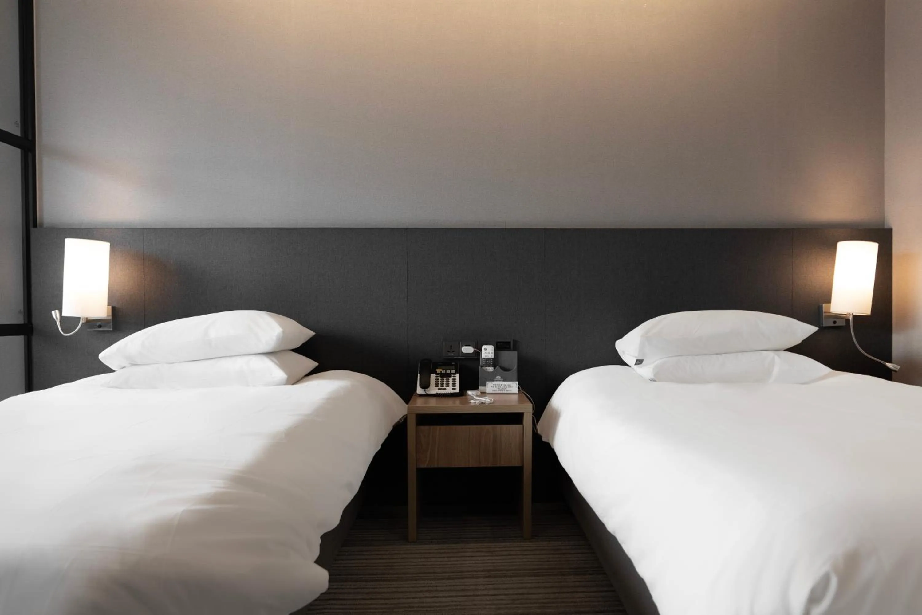 Bed in Northharbor Hotel