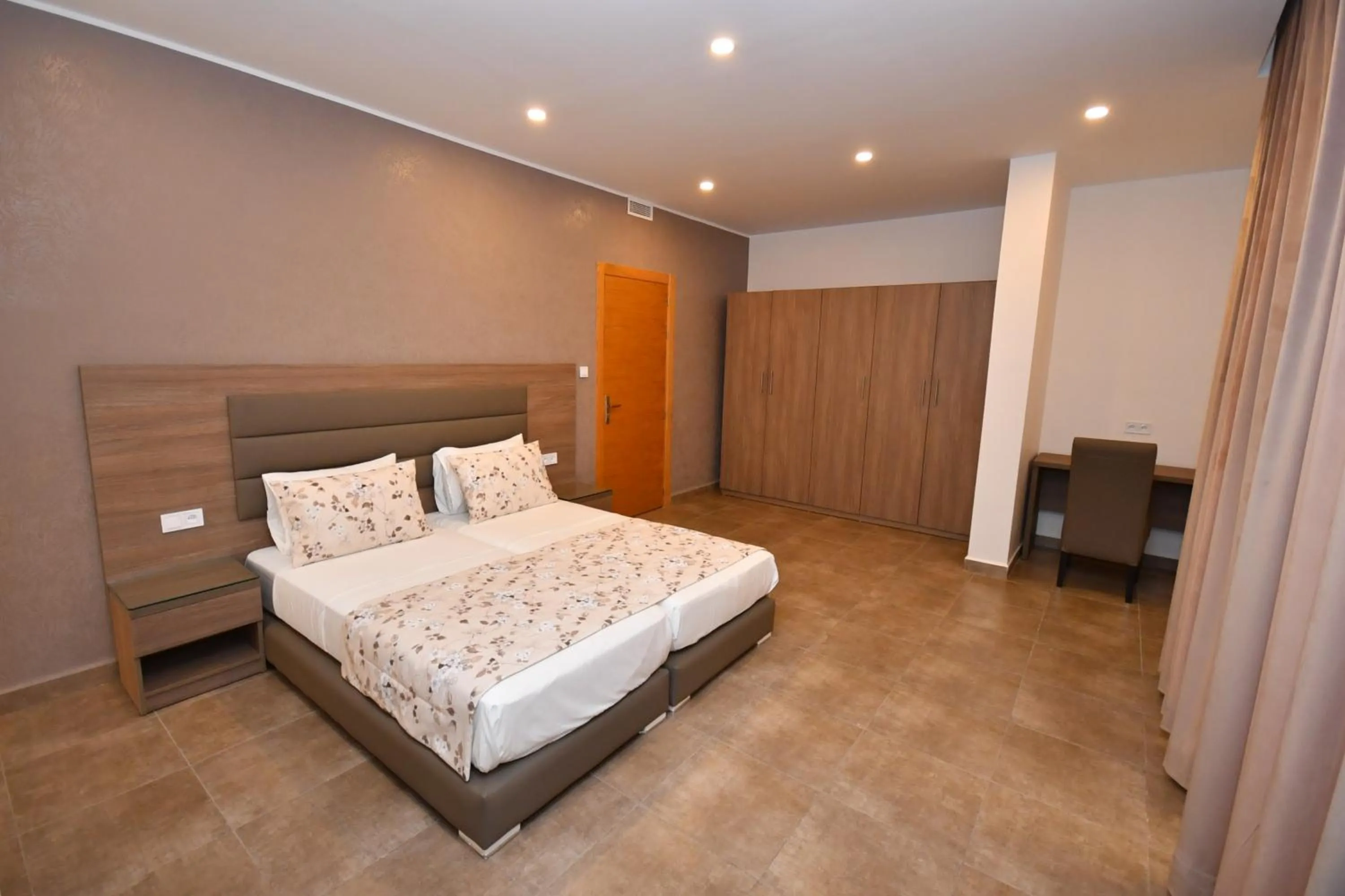 Bedroom in Appart Hôtel Ryadi